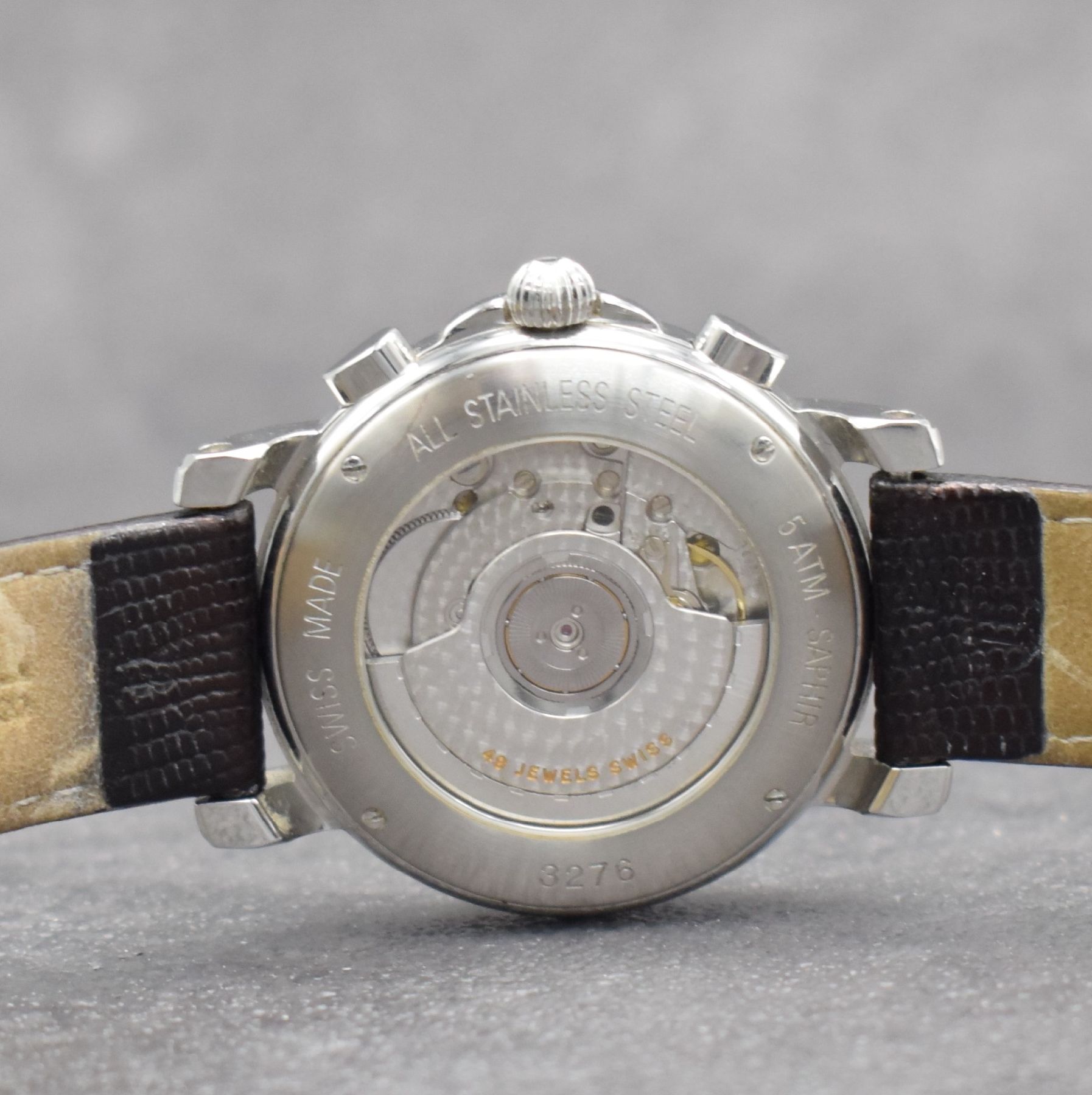 Detail d: JAQUET GIRARD Armbandchronograph mit Großdatum, Schweiz um 2000, Automatik, beids. vergl. Edelstahlgeh., geriffelte Lünette, Boden 4- fach ...
