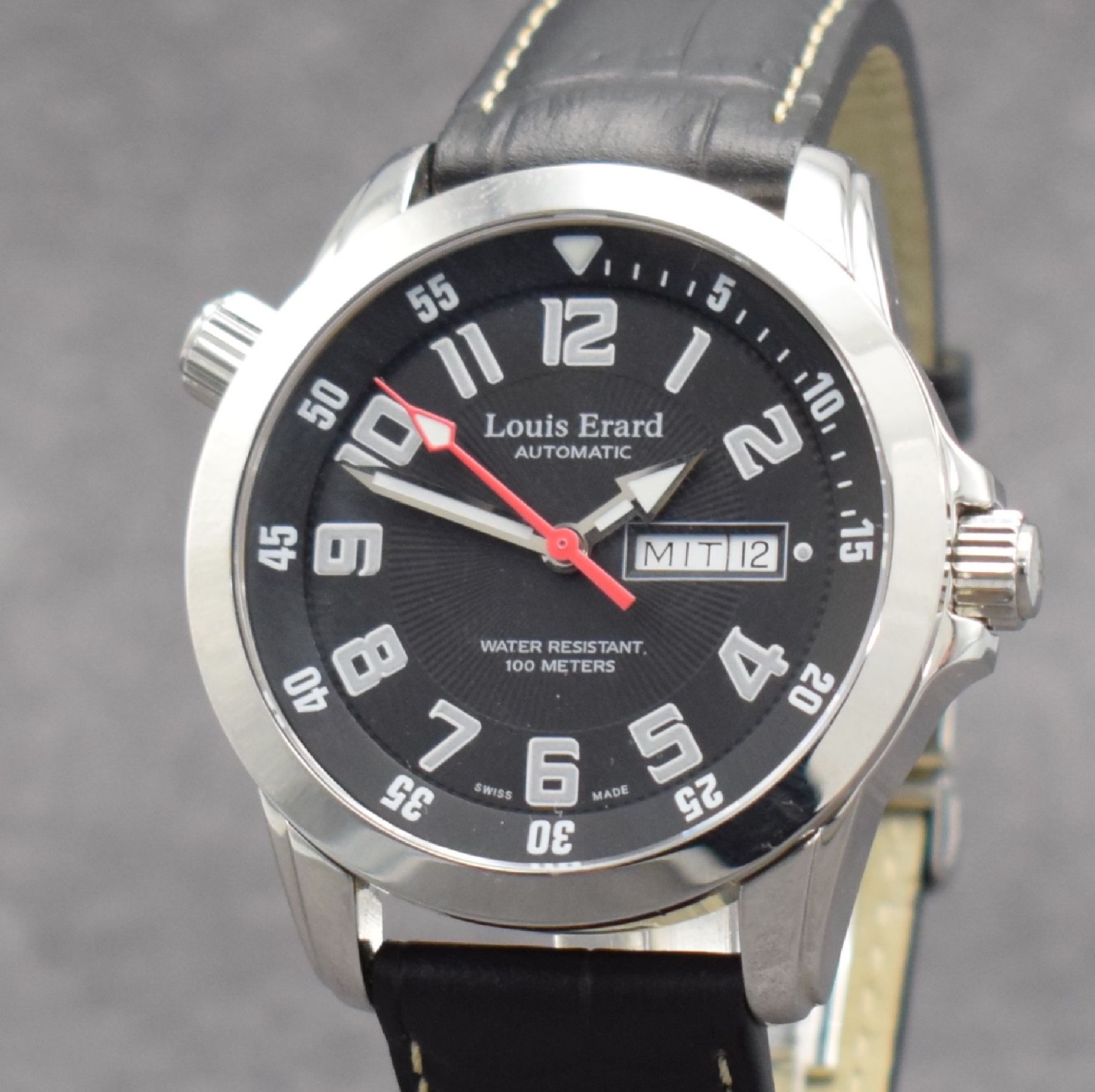 Detail c: LOUIS ERARD Herrenarmbanduhr mit Tag & Datum, Schweiz um 2008, Automatik, Edelstahlgeh., Boden geschr., schwarzes Zifferbl. m. arab. Zahlen, rote ...
