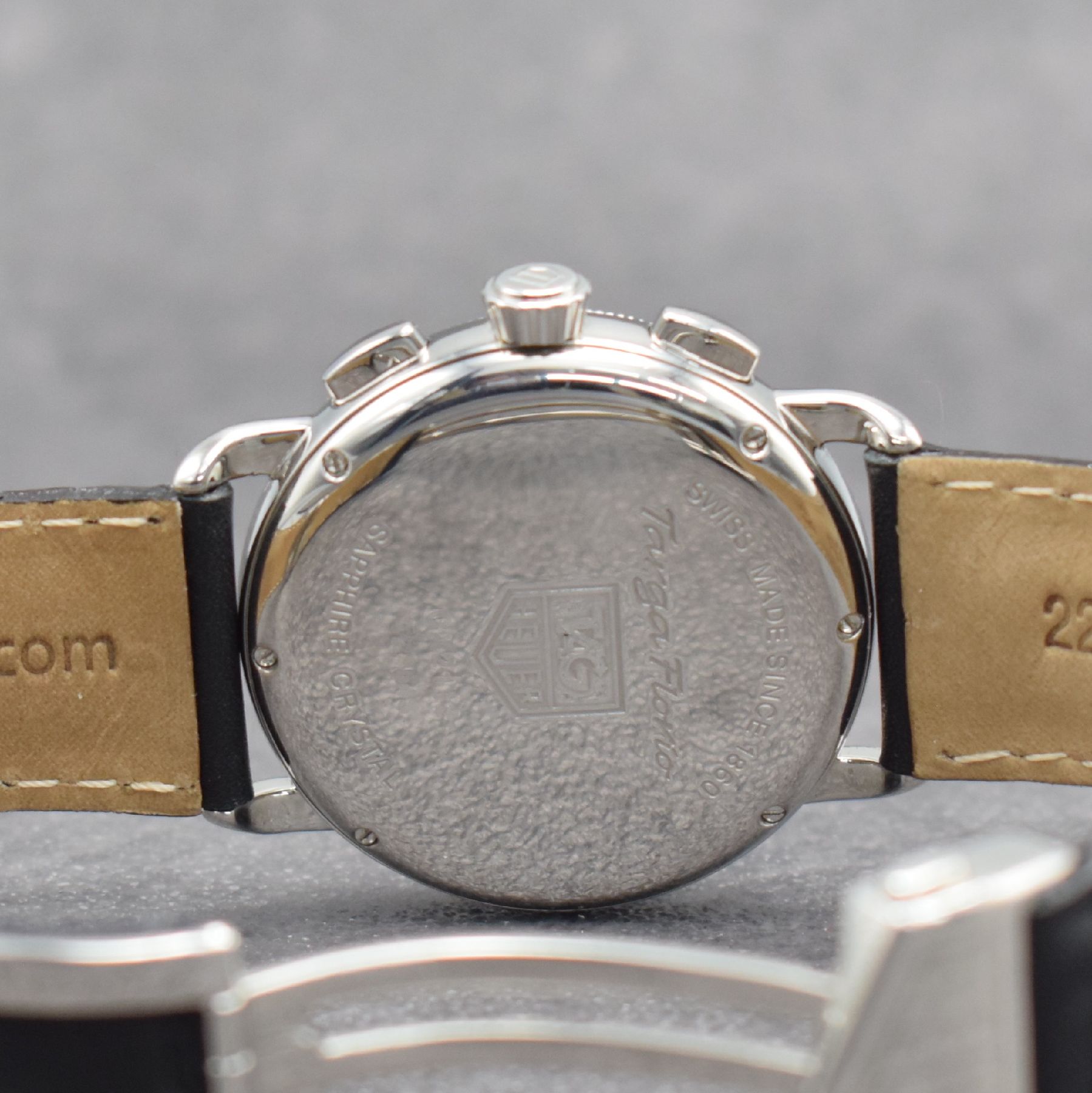 Detail e: TAG HEUER Herrenarmbanduhr mit Chronograph Modell TARGA FLORIO, Schweiz um 2002, Automatik, Ref. CX2112, Edelstahlgeh., Lederband m. orig. Faltschl. ...