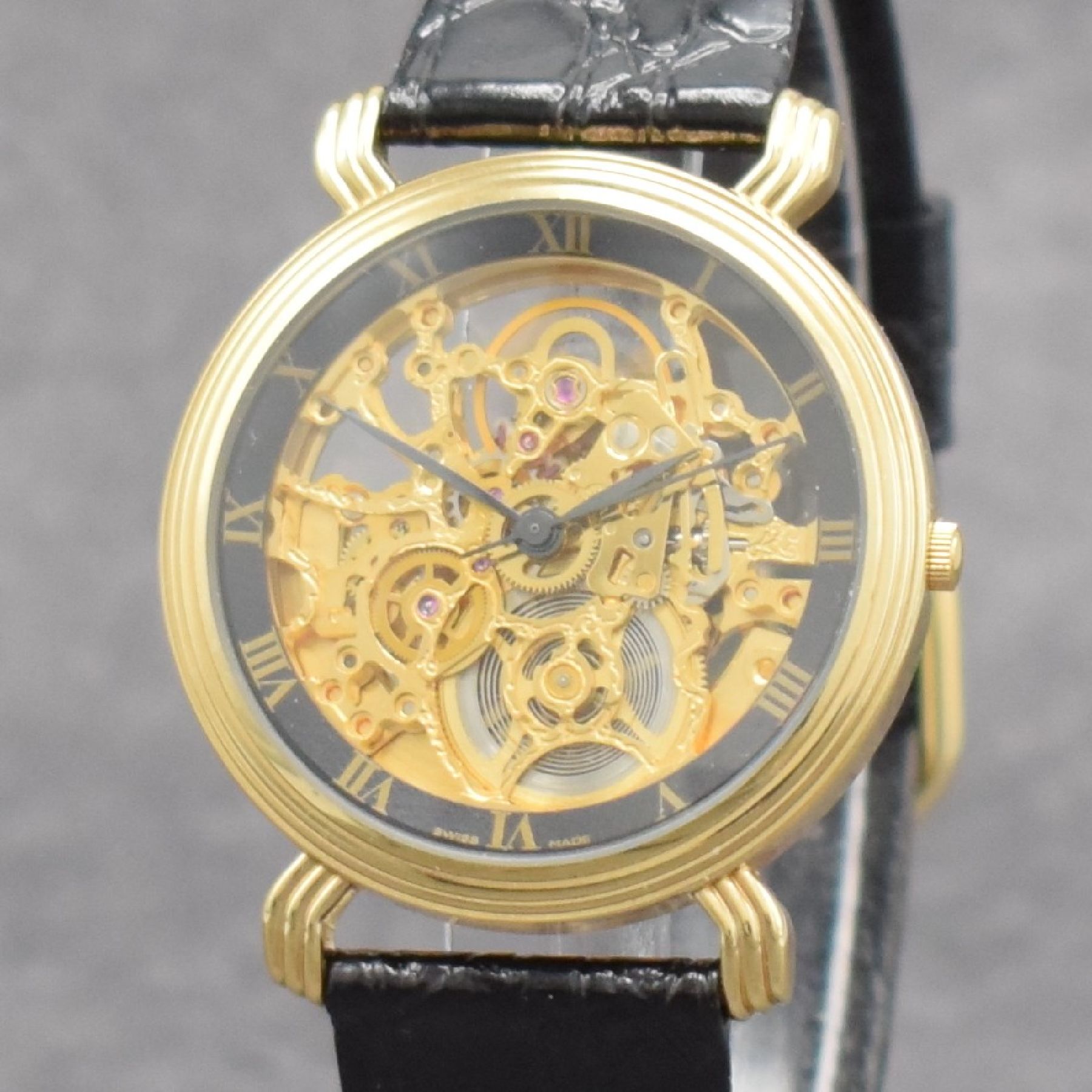 Detail c: ROAMER skelettierte Herrenarmbanduhr, Automatik, Schweiz um 1990, verg. Geh. beids. vergl., äußerer Zifferblattring m. röm. Std., Anz. v. Std., ...