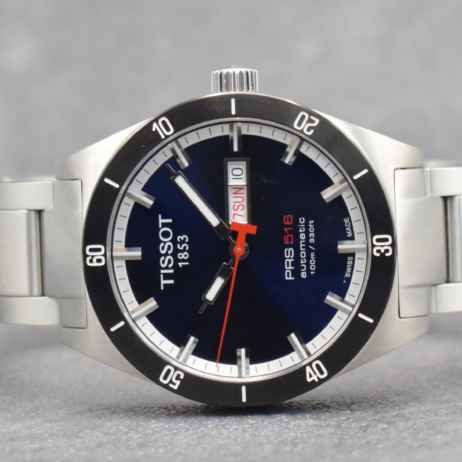 Detail a: TISSOT PRS 516 Herrenarmbanduhr, Automatik, Schweiz um 2011, Ref. T044430A, Edelstahlgeh. inkl. Gliederband m. dopp. Faltschl., beids. vergl., Boden ...