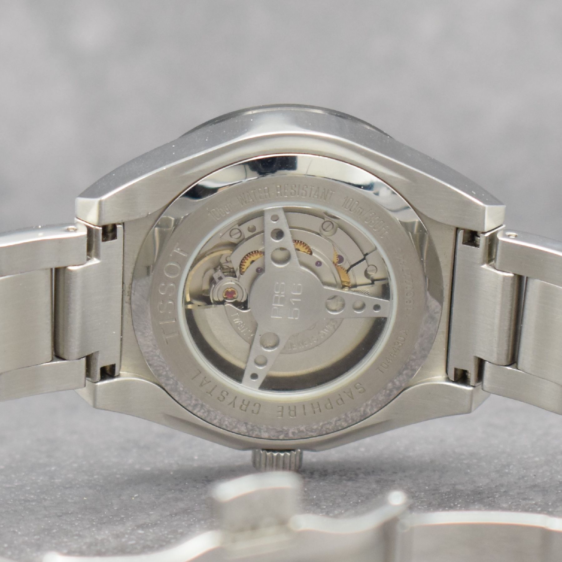 Detail g: TISSOT PRS 516 Herrenarmbanduhr, Automatik, Schweiz um 2011, Ref. T044430A, Edelstahlgeh. inkl. Gliederband m. dopp. Faltschl., beids. vergl., Boden ...