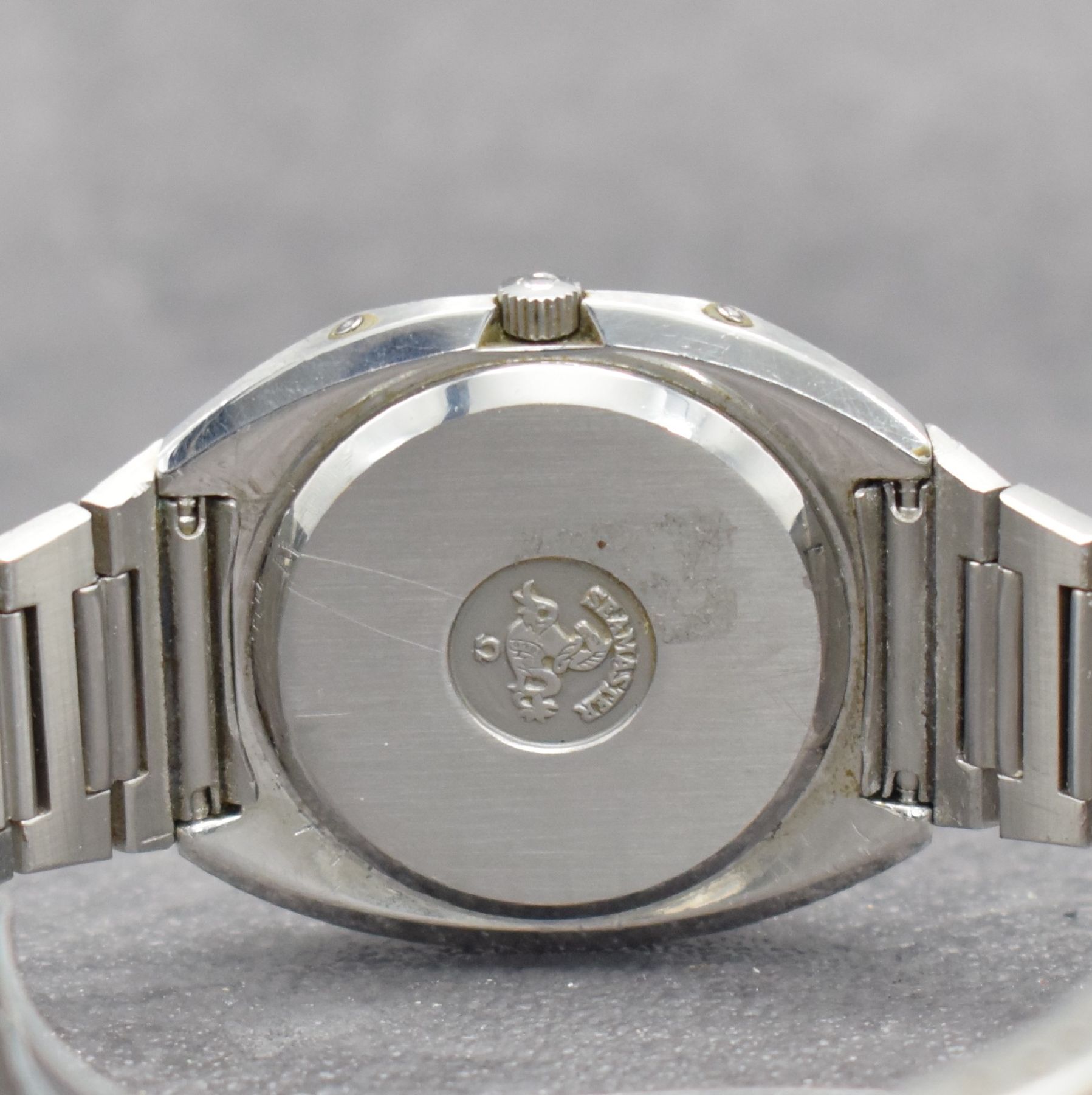 Detail f: OMEGA Herrenarmbanduhr Modell Seamaster, Ref. 1960054, Schweiz um 1977, Edelstahlgeh. inkl. Gliederband m. Faltschl., Boden m. Seepferdchenlogo ...