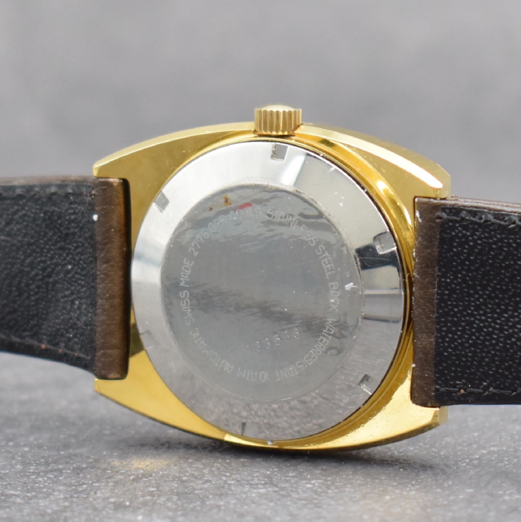 Detail h: Konvolut: 2 DUGENA Armbanduhren Serie Monza, Schweiz um 1980, beide verg. Metallgeh., Edelstahlböden verschr., silberne Zifferblätter m. aufgel. ...