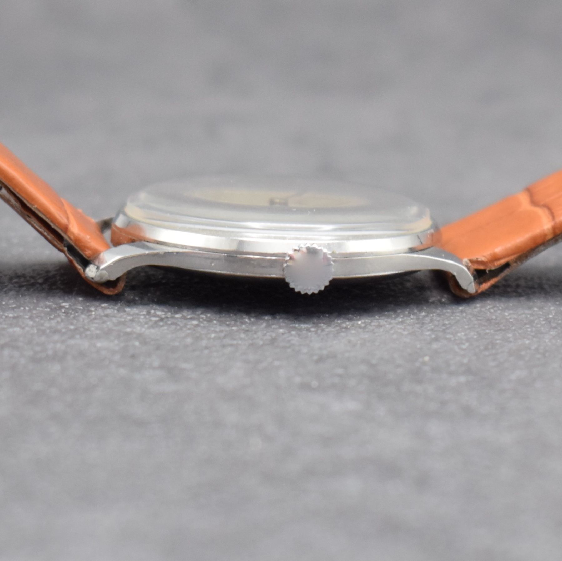 Detail c: NICOLET WATCH Herrenarmbanduhr, Schweiz 1940er Jahre, Handaufzug, 3-teil. Gehäuse in Stahl, Boden & Glasrand aufgedr., silb. Zifferbl. m. röm. ...