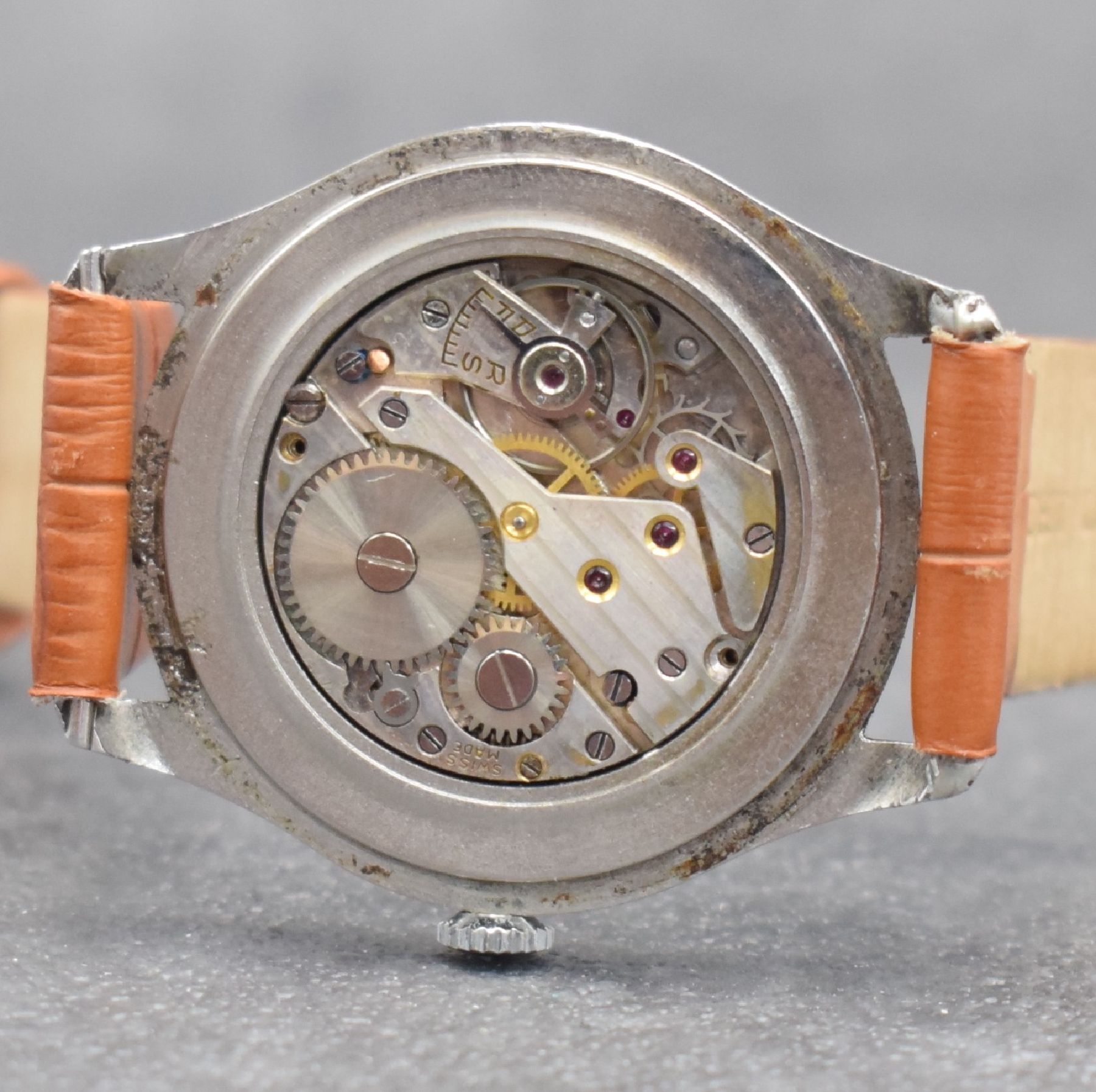 Detail f: NICOLET WATCH Herrenarmbanduhr, Schweiz 1940er Jahre, Handaufzug, 3-teil. Gehäuse in Stahl, Boden & Glasrand aufgedr., silb. Zifferbl. m. röm. ...