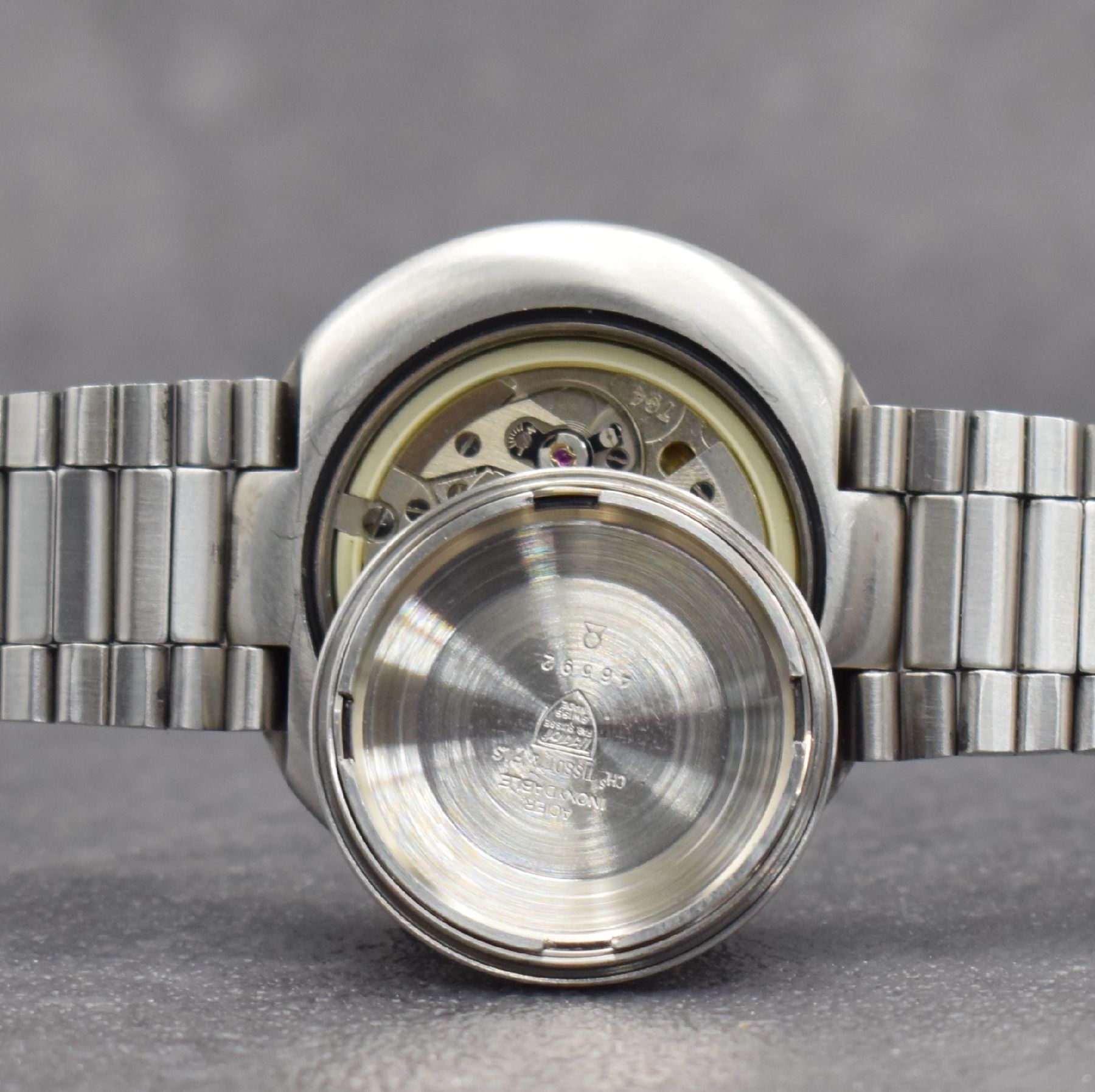 Detail i: TISSOT seltene, übergroße Herrenarmbanduhr T 12 an original Gay Freres Gliederband, Automatik, Schweiz um 1971, Ref. 46592, Boden verschr., blaues ...