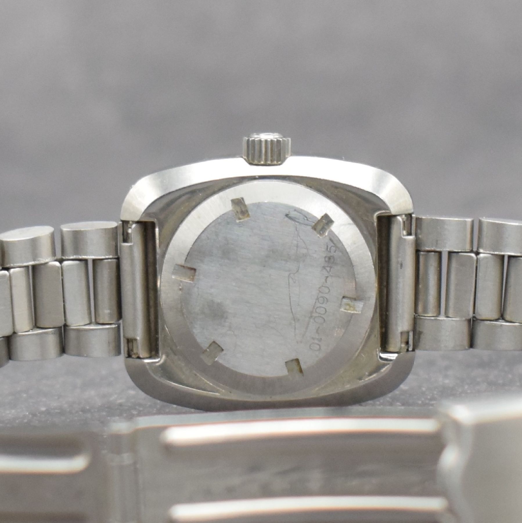 Detail f: ZENITH Damenarmbanduhr, Automatik, Schweiz um 1980, Edelstahlgeh. inkl. orig. Gliederband m. Faltschl., Boden verschr., graues Zifferbl. m. aufgel. ...
