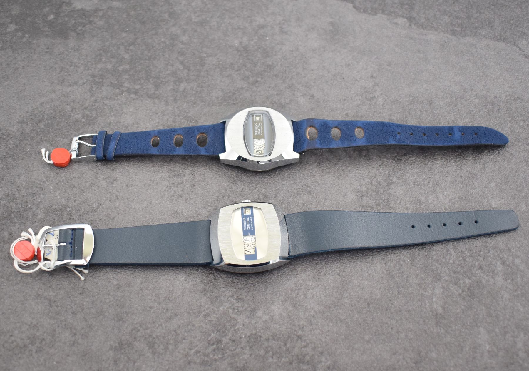 Detail f: Konvolut: 2 ungetragene DUGENA Digital Armbanduhren, Handaufzug, für den dtsch. Markt um 1970, beide rastende Std. & rotierende Min., verchr. ...