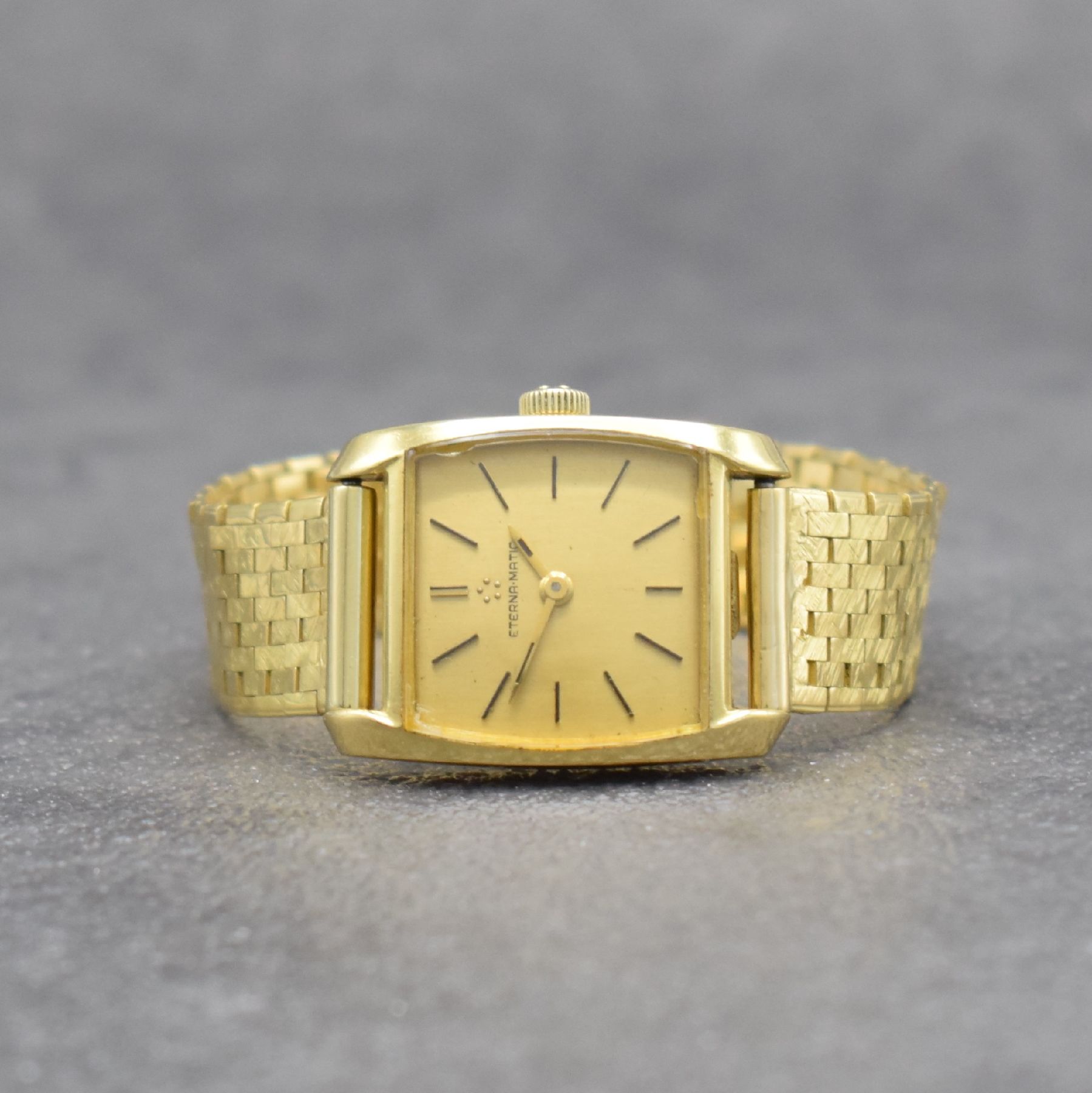 ETERNA-MATIC Damenarmbanduhr in GG 750/000, Schweiz um 1965, Automatik, aufgedr. Boden, Goldband in GG 750/000, gold. Zifferbl. m. aufges. Std.-Ind., ...