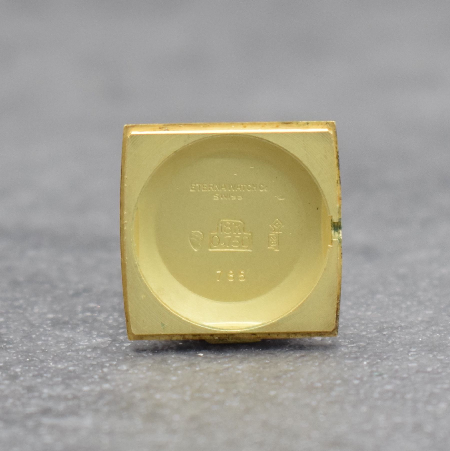 Detail e: ETERNA-MATIC Damenarmbanduhr in GG 750/000, Schweiz um 1965, Automatik, aufgedr. Boden, Goldband in GG 750/000, gold. Zifferbl. m. aufges. Std.-Ind., ...