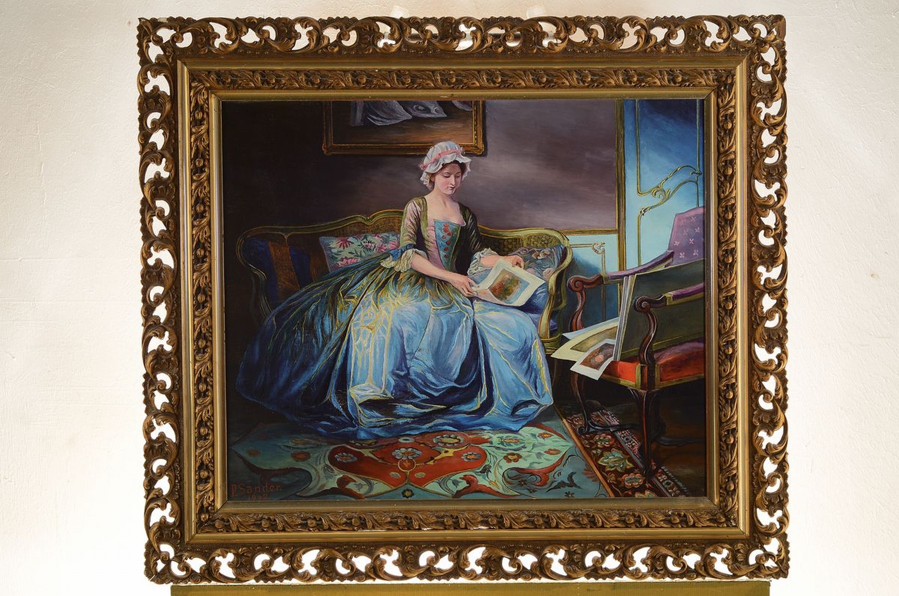 Detail k: Paul Sander, 1876-1942, Interieur mit junger Frau, die Bilder aus einer Mappe betrachtend, Öl/Lwd, links unten signiert und dat. 1942, ca. 53x64cm, ...