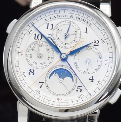 26242384b - A. LANGE & SÖHNE very fine and extreme rare, astronomical platinum gents wristwatch 1815 Rattrapante perpetual calendar, manual winding, reference 421.025FE, on both sides sapphire glazed, case back 6-times screwed, original leather strap with original platinum-deployant clasp, solid silver dial, display of hours, minutes, constant second, chronograph rattrapante, power reserve indicator, perpetual calendar with display of day, date, month, moon phase & leap year, correction at the sides in case inserted, very fine, rhodium plated movement, calibre L101.1, fausses cotes decoration, from Hand engraved bridges & vices, diameter approx. 41,9 mm, original box, papers & setting pin, sold in April 2016, condition 1-2, property of a collector