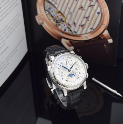 26242384c - A. LANGE & SÖHNE very fine and extreme rare, astronomical platinum gents wristwatch 1815 Rattrapante perpetual calendar, manual winding, reference 421.025FE, on both sides sapphire glazed, case back 6-times screwed, original leather strap with original platinum-deployant clasp, solid silver dial, display of hours, minutes, constant second, chronograph rattrapante, power reserve indicator, perpetual calendar with display of day, date, month, moon phase & leap year, correction at the sides in case inserted, very fine, rhodium plated movement, calibre L101.1, fausses cotes decoration, from Hand engraved bridges & vices, diameter approx. 41,9 mm, original box, papers & setting pin, sold in April 2016, condition 1-2, property of a collector