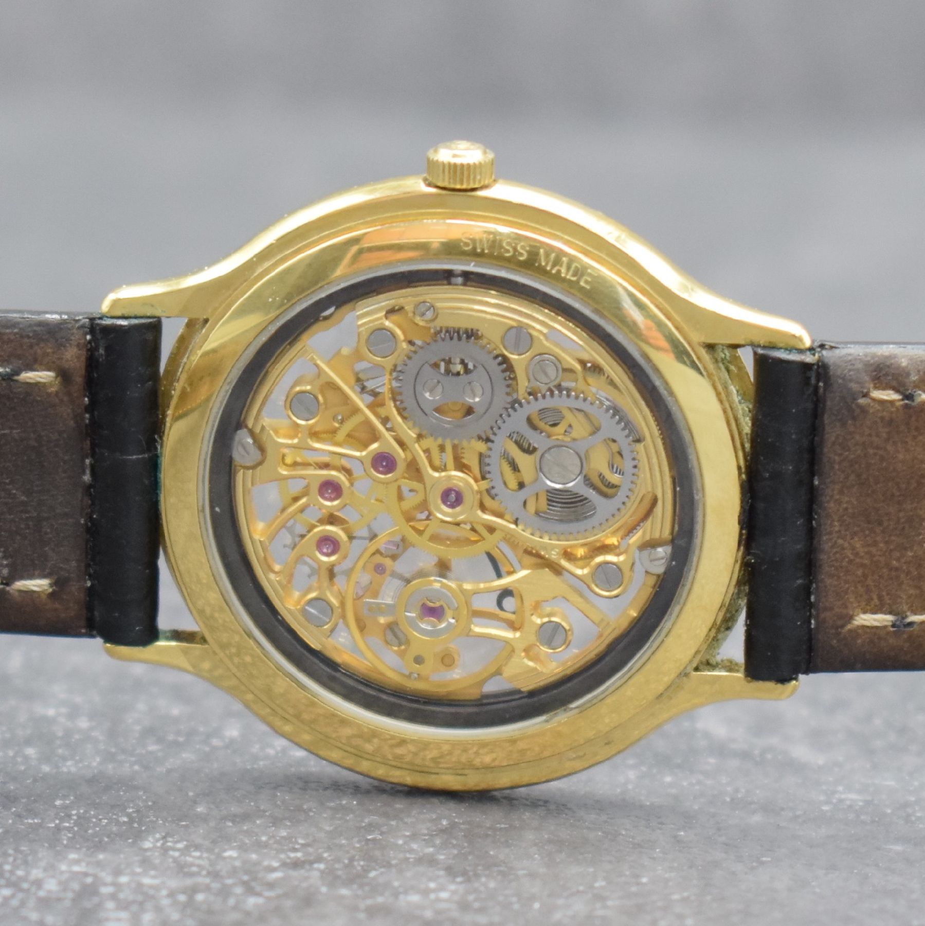Detail d: MAURICE LACROIX skelettierte Armbanduhr, Schweiz verk. lt. Pap. 07/1988, Handaufzug, verg. Geh. beids. vergl., Boden aufgedr., orig. Lederband m. ...