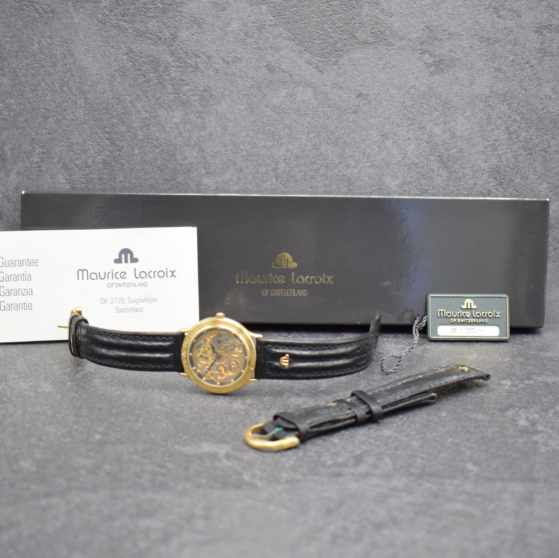 Detail h: MAURICE LACROIX skelettierte Armbanduhr, Schweiz verk. lt. Pap. 07/1988, Handaufzug, verg. Geh. beids. vergl., Boden aufgedr., orig. Lederband m. ...