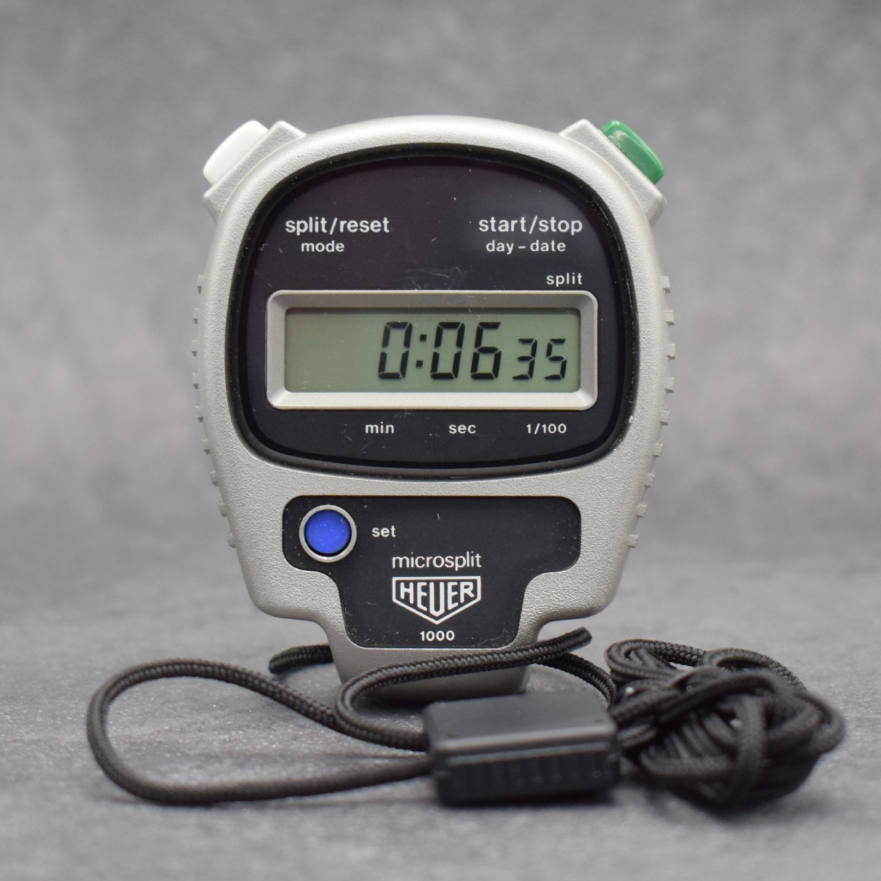 Detail f: Konvolut: 2 Stoppuhren, 1) HEUER microsplit Einhandstoppuhr, Schweiz um 1975, mit digitaler Anzeige, orig. Etui & Gebrauchsanweisung anbei, EZ 2 2) ...