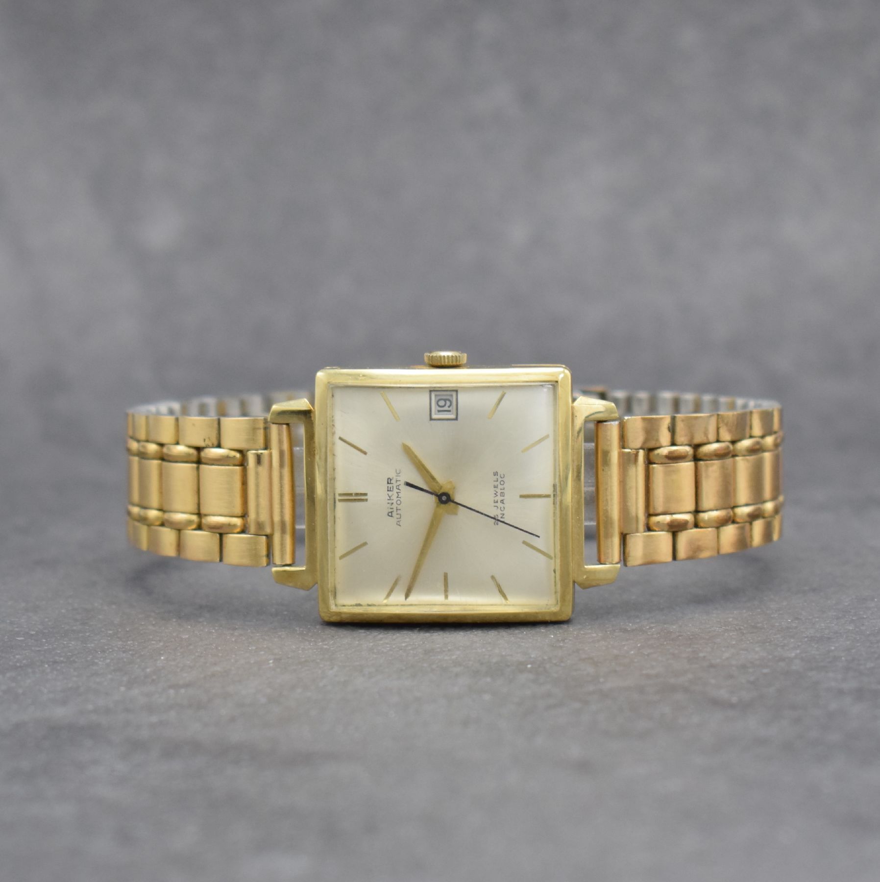 ANKER Herrenarmbanduhr in GG 585/000, Deutschland um 1960, Automatik, 2-teil. Geh., Boden aufgedr., verg. Gliederband später, silb. Zifferbl., ...