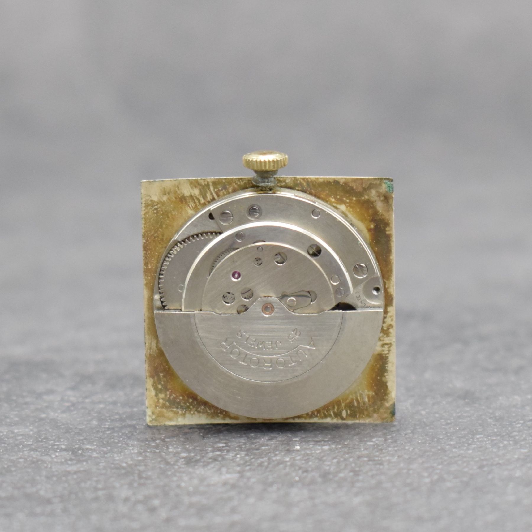 Detail e: ANKER Herrenarmbanduhr in GG 585/000, Deutschland um 1960, Automatik, 2-teil. Geh., Boden aufgedr., verg. Gliederband später, silb. Zifferbl., ...