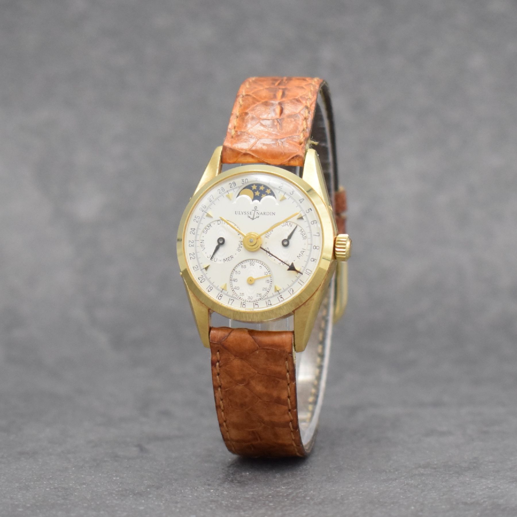 Detail b: ULYSSE NARDIN Damenarmbanduhr mit Vollkalender in GG 750/000, Schweiz um 1980, Handaufzug, Ref. 311 51, 3-teil. Geh., Boden & Glasrand aufgedr., ...
