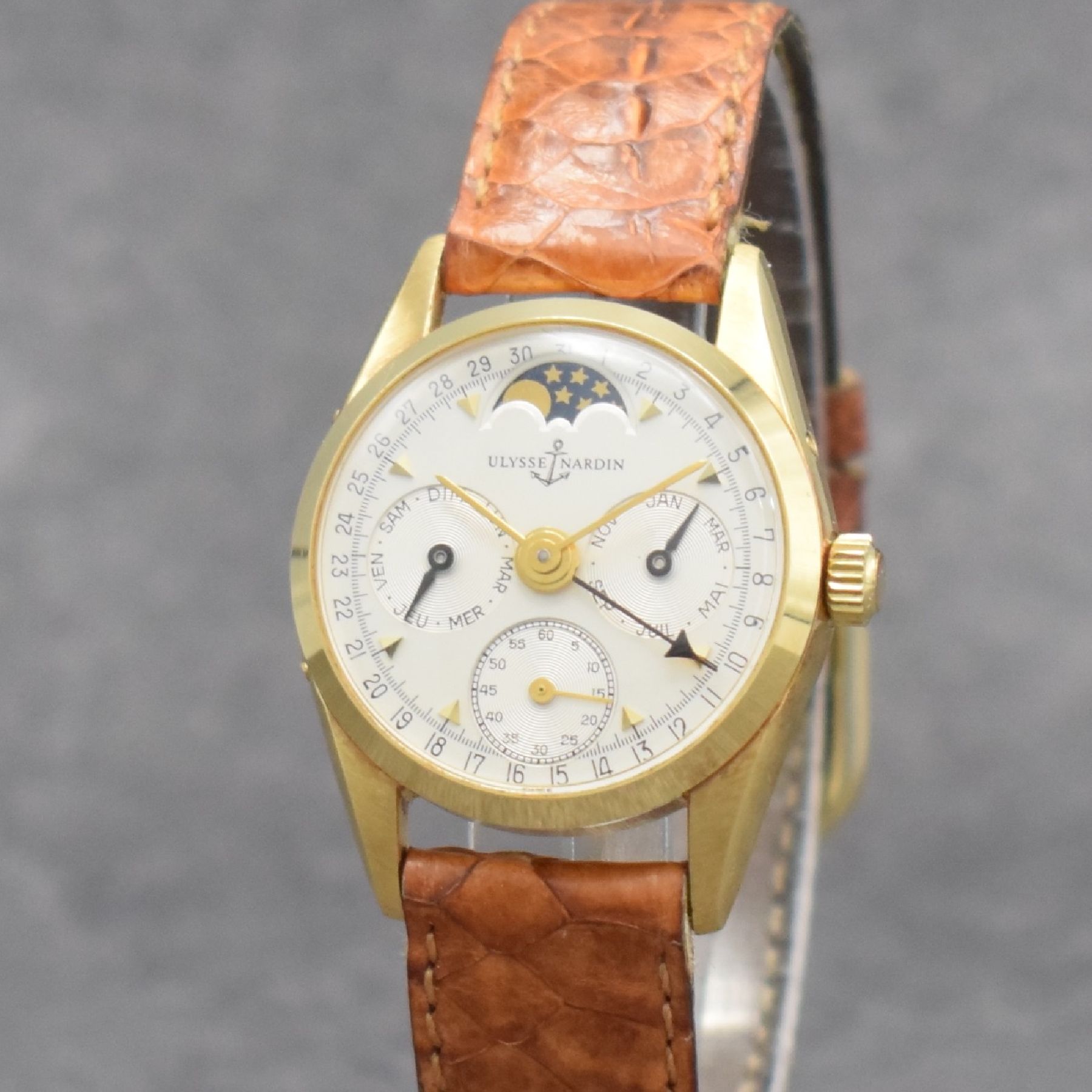Detail c: ULYSSE NARDIN Damenarmbanduhr mit Vollkalender in GG 750/000, Schweiz um 1980, Handaufzug, Ref. 311 51, 3-teil. Geh., Boden & Glasrand aufgedr., ...