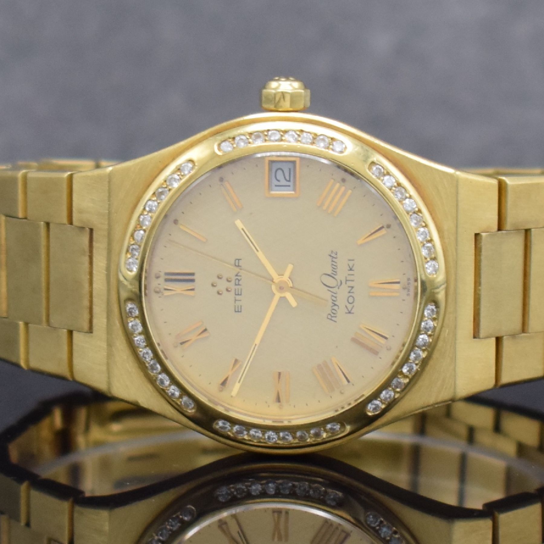 Detail a: ETERNA Kontiki Royal Quartz Herrenarmbanduhr in GG 750/000, Schweiz um 1985, quarz, massives Geh., Boden aufgedr., Gliederband in GG 750/000 m. ...