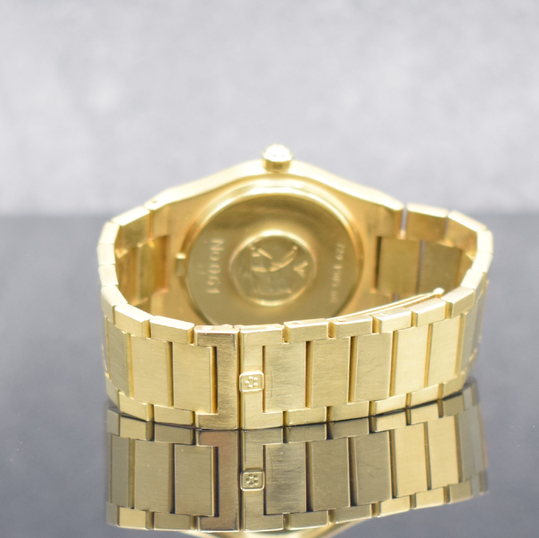 Detail d: ETERNA Kontiki Royal Quartz Herrenarmbanduhr in GG 750/000, Schweiz um 1985, quarz, massives Geh., Boden aufgedr., Gliederband in GG 750/000 m. ...