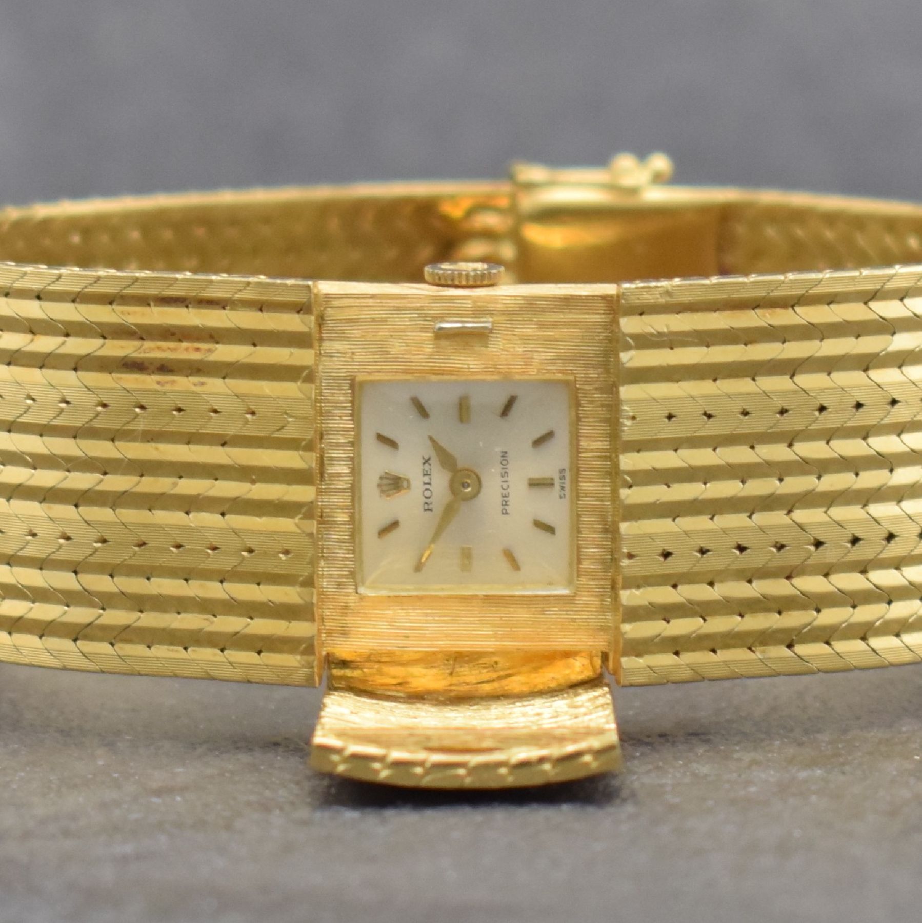 Detail a: ROLEX seltene Damenarmbanduhr in Bandform, Schweiz um 1960, Handaufzug, GG 750/000, v. Gehäuse ins Band übergehendes Design m. aufklappbarem ...