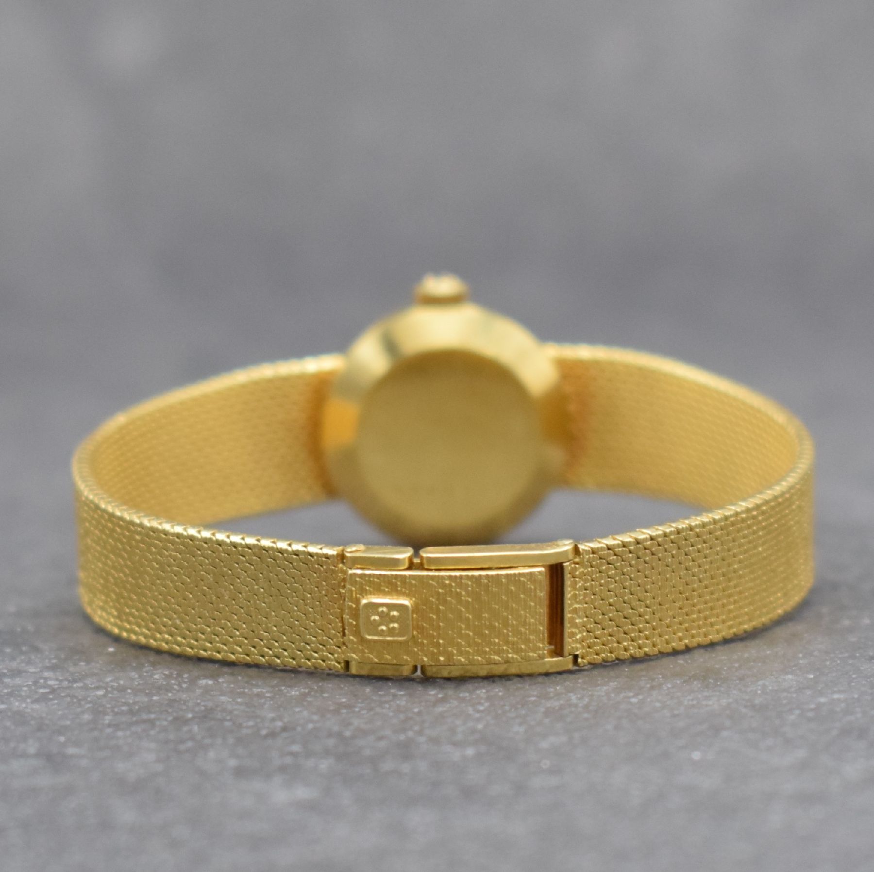 Detail d: ETERNA Sahida Damenarmbanduhr in GG 750/000, Schweiz um 1965, Automatik, gedr. Geh. am orig. Milanaiseband, orig. Krone & Glas, gold. Zifferbl., ...
