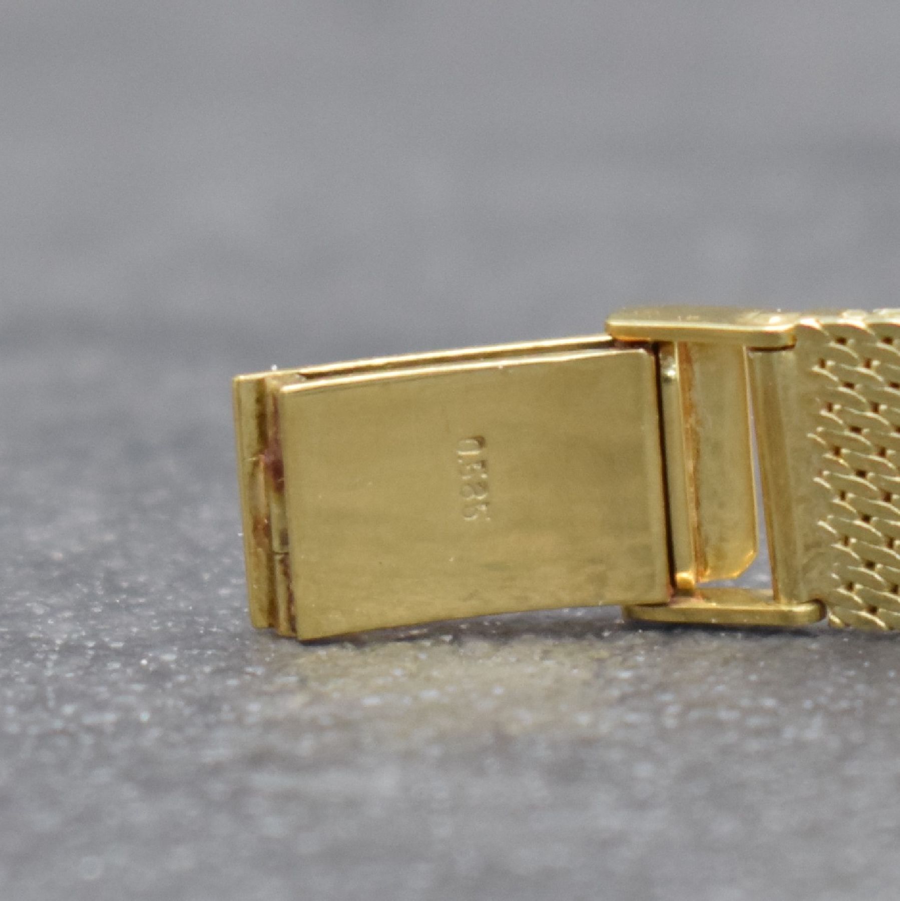 Detail d: RHODOS Diamantbesetzte Damenarmbanduhr in GG 585/000, Schweiz um 1965, Handaufzug, durchgehendes Milanaiseband, silb. Zifferbl. unter ...