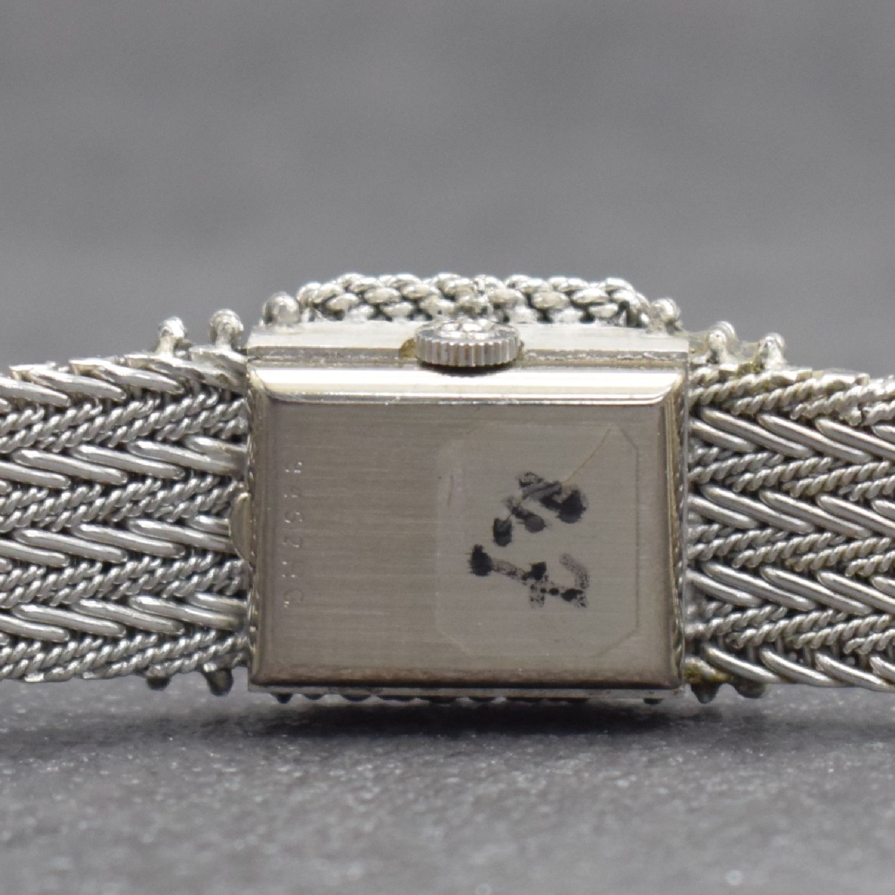 Detail f: GIRARD PERREGAUX ausgefallene Damenarmbanduhr in WG 750/000, Schweiz um 1970, Handaufzug, rechteck. Geh. m. schleifen-artig geflochtener Front, silb. ...
