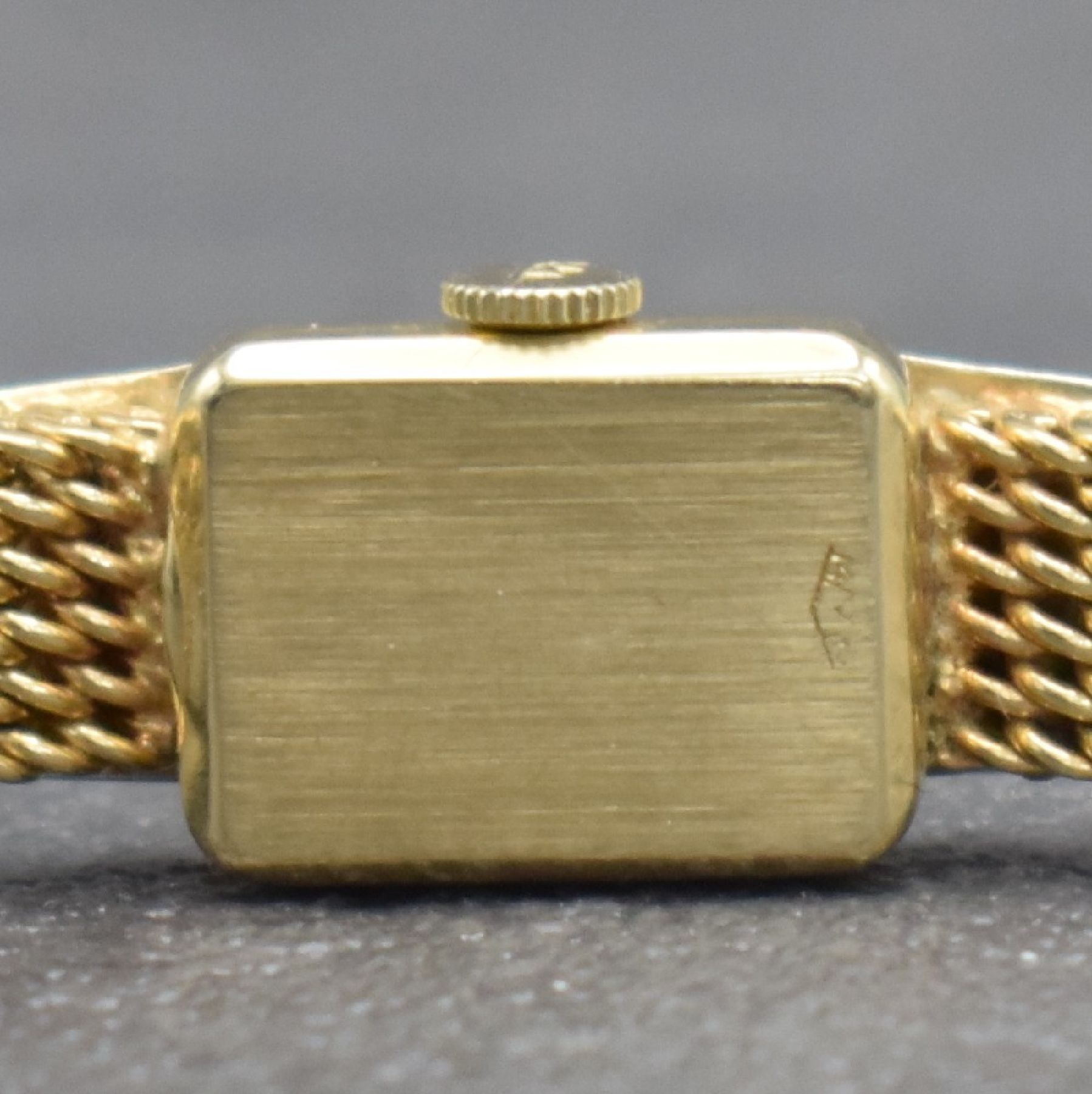 Detail f: MOVADO Diamantbesetzte Damenarmbanduhr in GG 585/000, Schweiz/USA um 1960, Handaufzug, gedr. Geh., anges. Milanaiseband, orig. Krone, silb. Zifferbl. ...