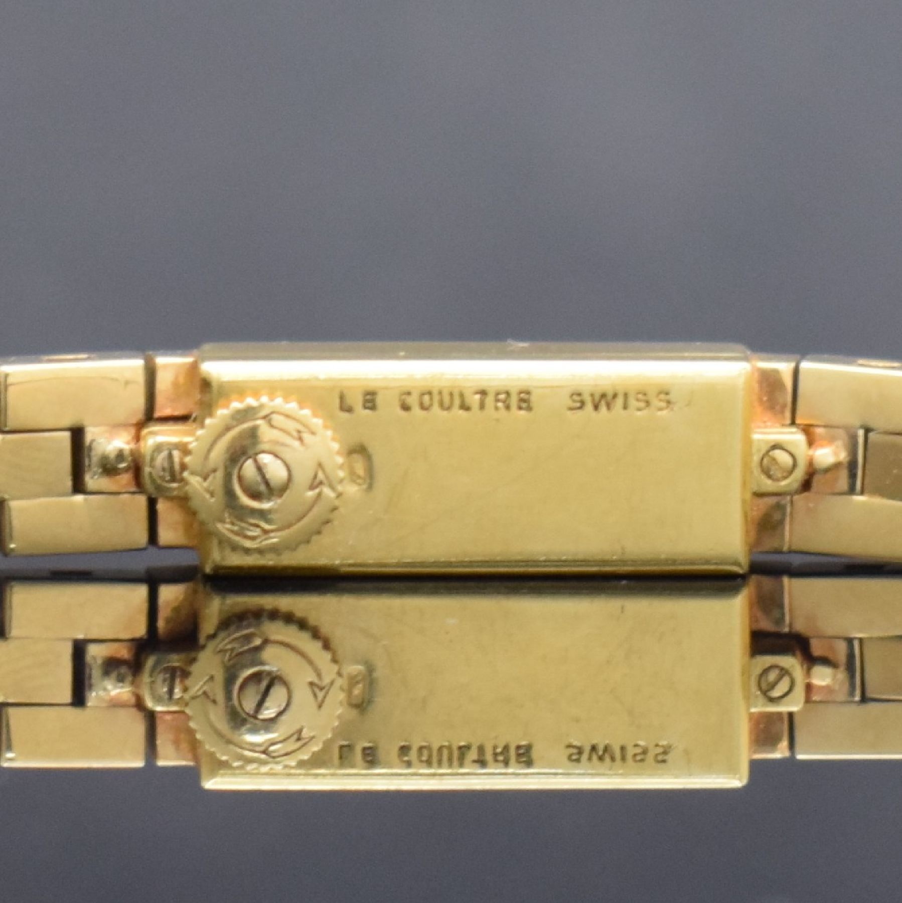 Detail c: LeCOULTRE Duo-Plan Damenarmbanduhr in GG 750/000, Schweiz um 1945, Handaufzug, 2-fach verschr. Baguette-Geh., integr. 3-reihiges Backsteinband, ...