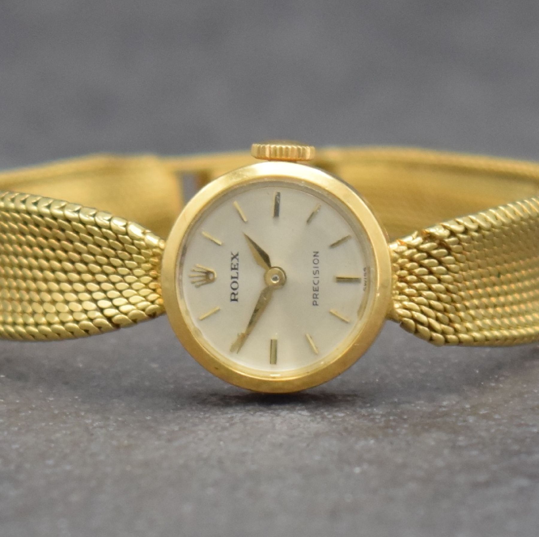 Detail a: ROLEX Damengoldbanduhr in GG 750/000, Schweiz um 1950, Handaufzug, gedr. Geh., anges. Milanaiseband zum Geh. gerafft, silb. Zifferbl., gold. Indizes ...