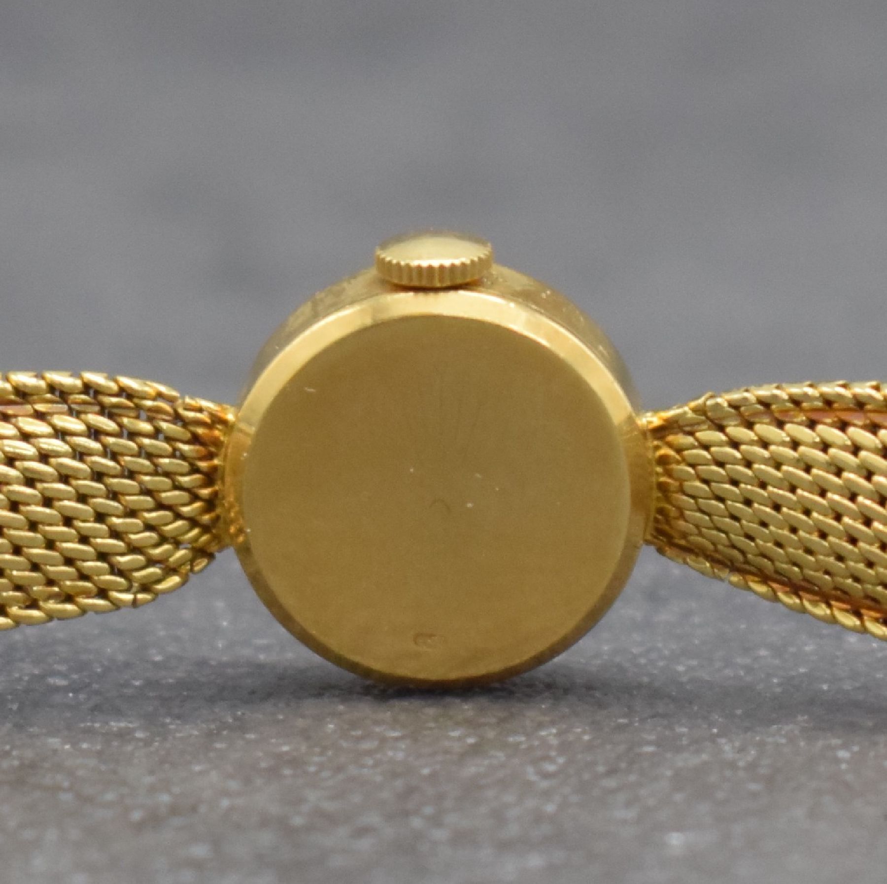 Detail d: ROLEX Damengoldbanduhr in GG 750/000, Schweiz um 1950, Handaufzug, gedr. Geh., anges. Milanaiseband zum Geh. gerafft, silb. Zifferbl., gold. Indizes ...