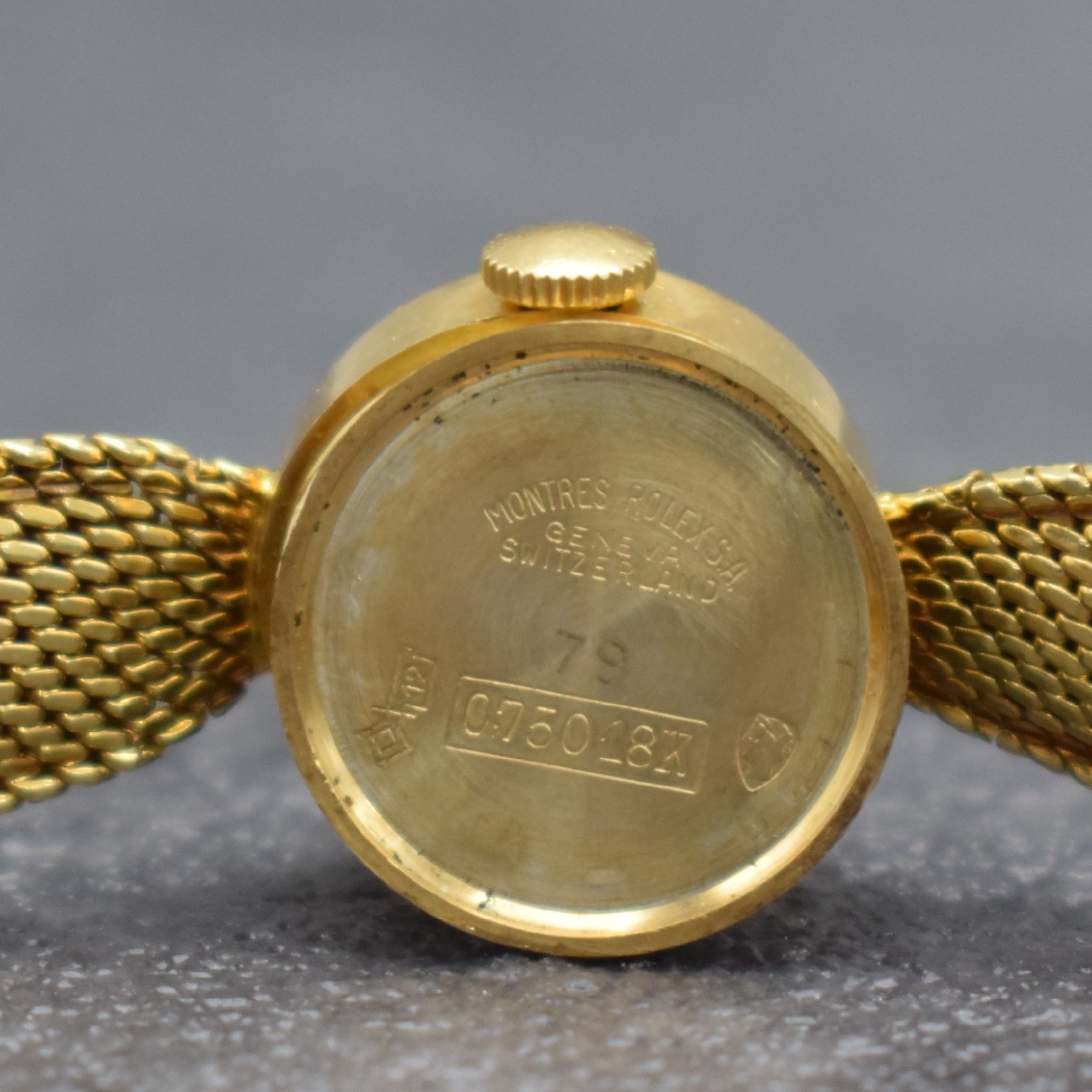 Detail f: ROLEX Damengoldbanduhr in GG 750/000, Schweiz um 1950, Handaufzug, gedr. Geh., anges. Milanaiseband zum Geh. gerafft, silb. Zifferbl., gold. Indizes ...