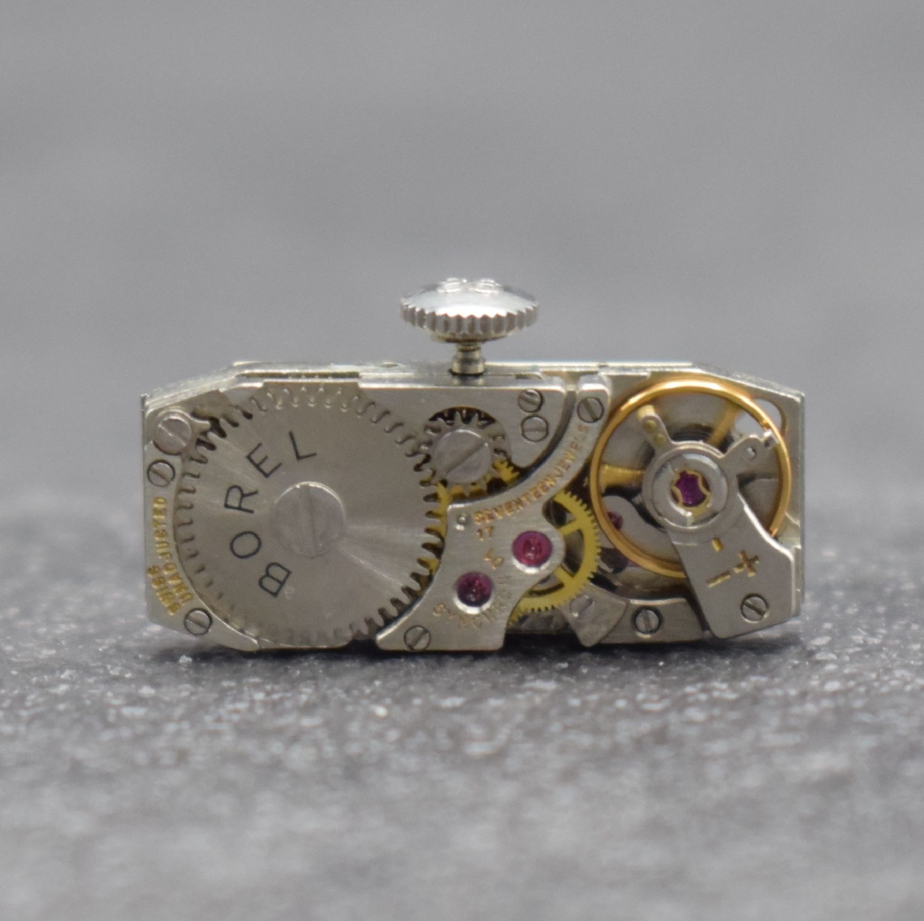 Detail e: ERNST BOREL Baguette-Damenarmbanduhr in WG 750/000, Schweiz um 1970, Handaufzug, gedr. Geh., Milanaiseband mit durchlaufender Schraffur, rechteck. ...