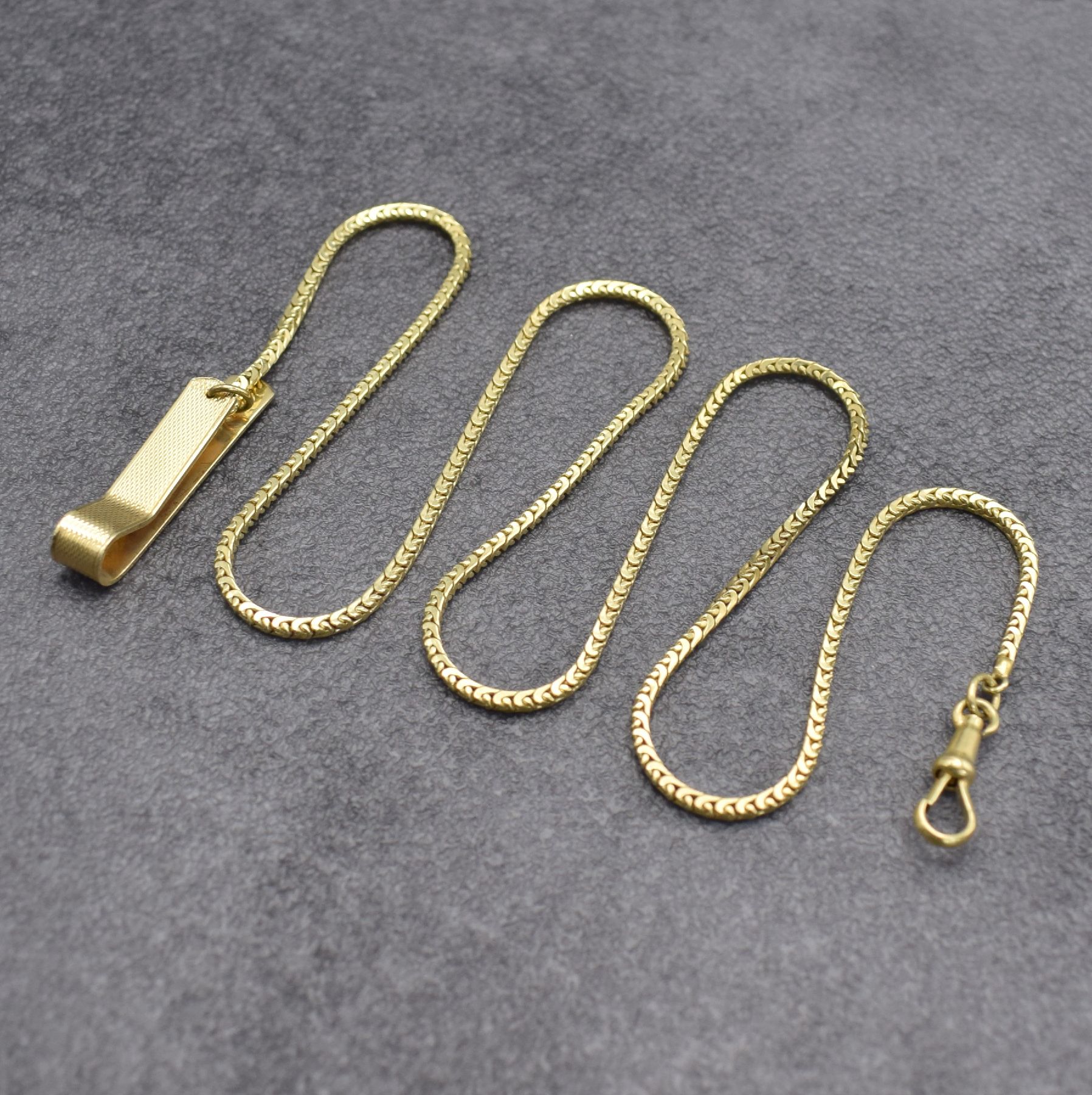 Detail b: Taschenuhrkette in GG 585/000, Deutschland um 1960, mit Karabiner & Klips, L. ca. 59 cm, Gew. ca. 25g, guter Zustand, aus dem Nachlass eines Sammlers