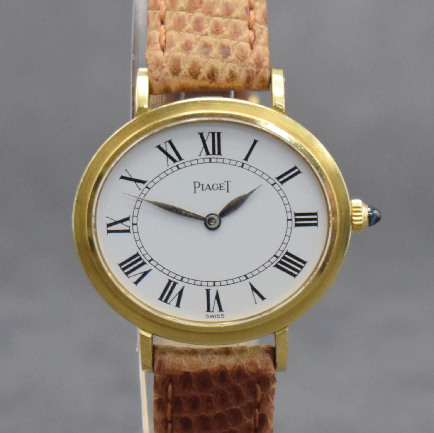 Detail c: PIAGET Damenarmbanduhr in GG 750/000, Schweiz um 1975, Handaufzug, Ref. 9801, 2- teil. Geh., Boden 2-fach verschr., weißes Zifferbl. m. röm. ...