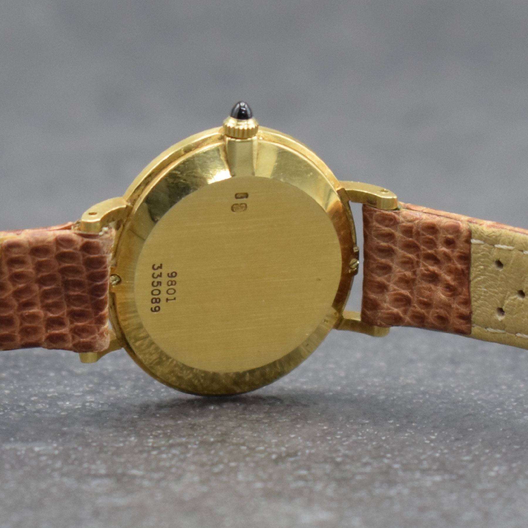 Detail f: PIAGET Damenarmbanduhr in GG 750/000, Schweiz um 1975, Handaufzug, Ref. 9801, 2- teil. Geh., Boden 2-fach verschr., weißes Zifferbl. m. röm. ...