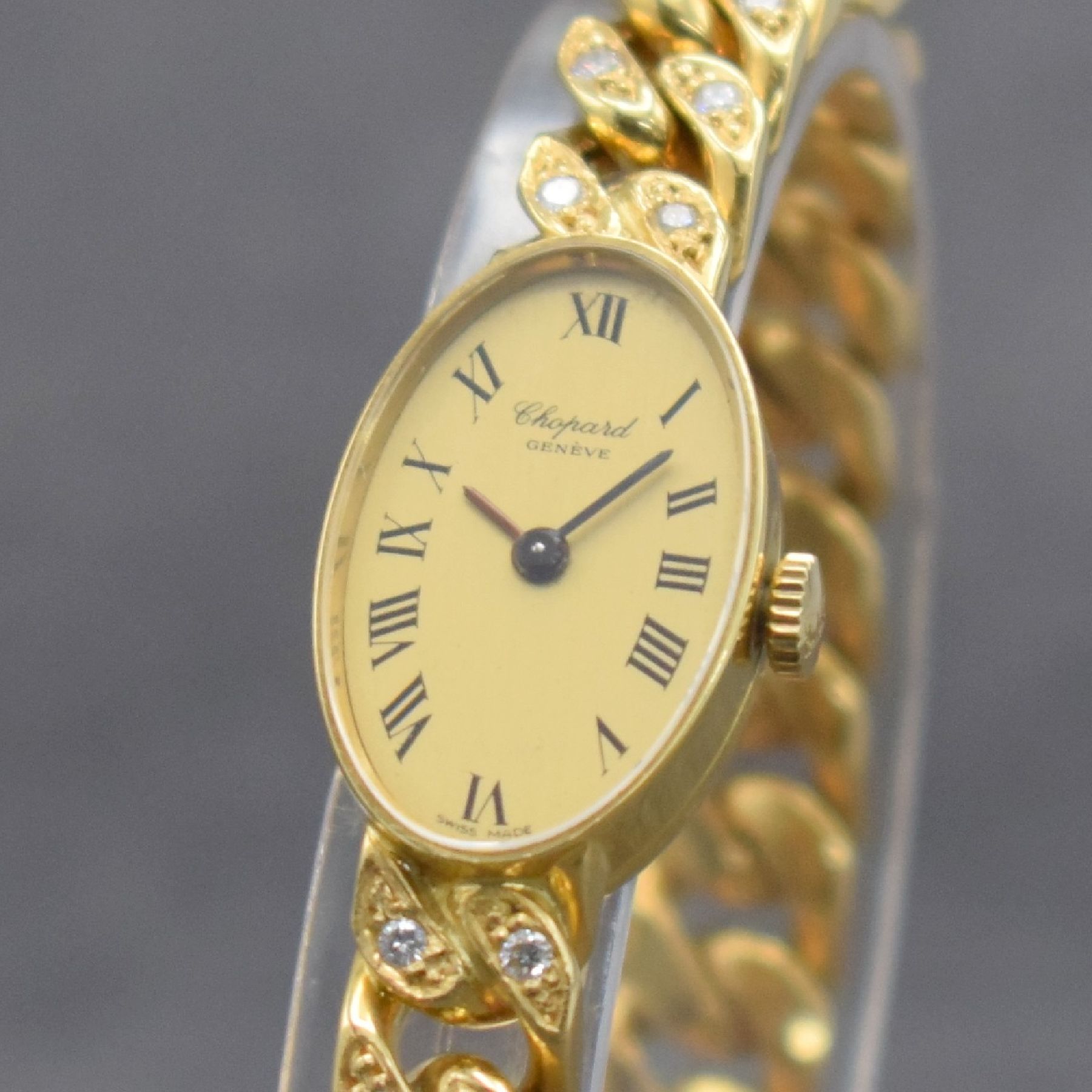 Detail h: CHOPARD Damenarmbanduhr in GG 750/000, Schweiz um 1975, Handaufzug, Ref. 5026, ovales Geh., Boden aufgedr., Ketten-Gliederband in GG 750/000 teils m. ...