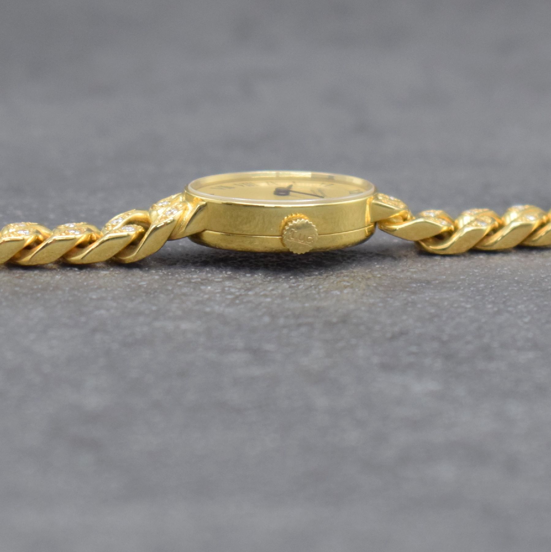 Detail j: CHOPARD Damenarmbanduhr in GG 750/000, Schweiz um 1975, Handaufzug, Ref. 5026, ovales Geh., Boden aufgedr., Ketten-Gliederband in GG 750/000 teils m. ...