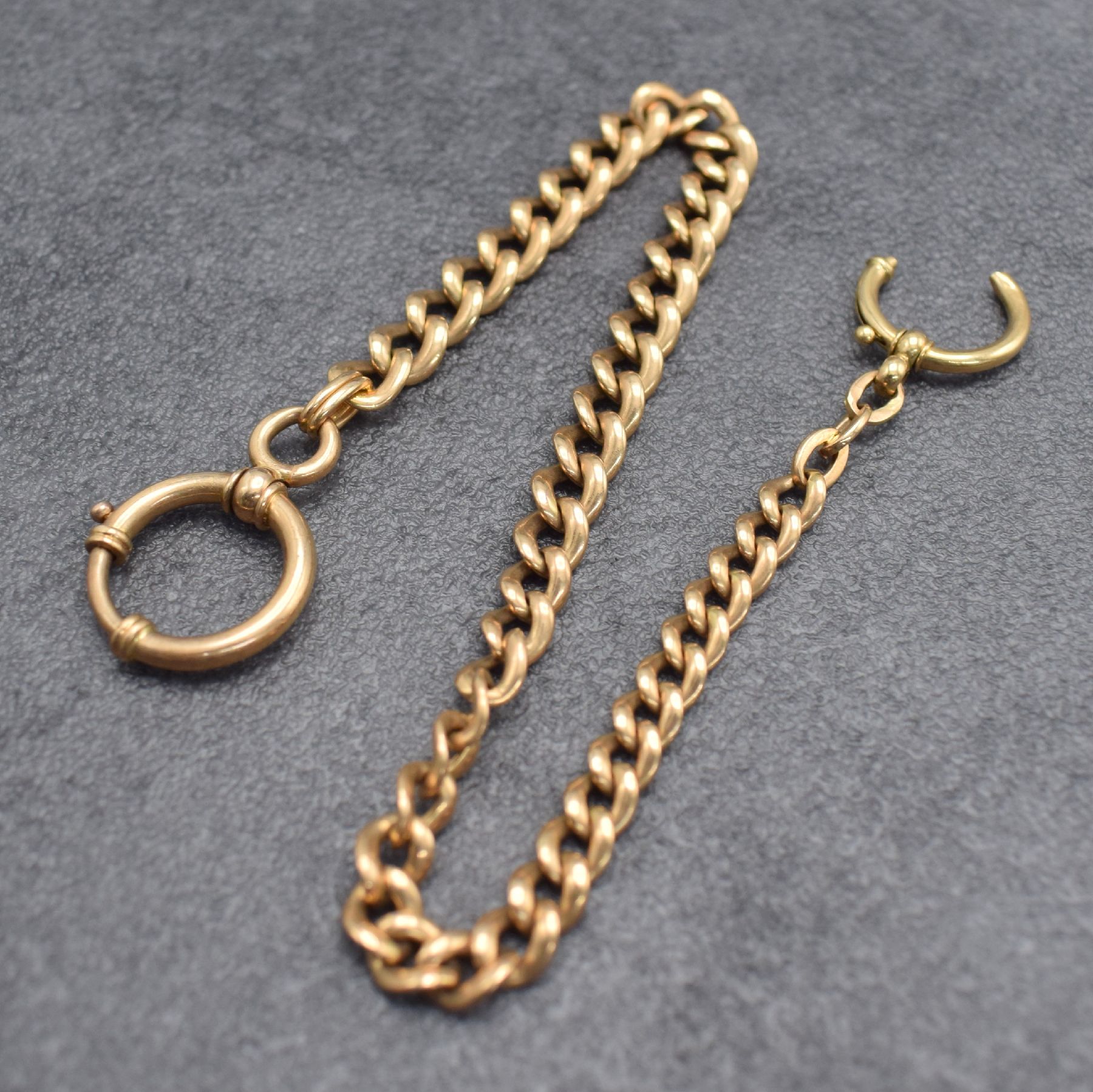 Detail a: Taschenuhrkette in RG 585/000, Deutschland um 1900, m. Federring (1x defekt), L. ca. 30,5 cm, Gew. ca. 34g, aus dem Nachlass eines Sammlers