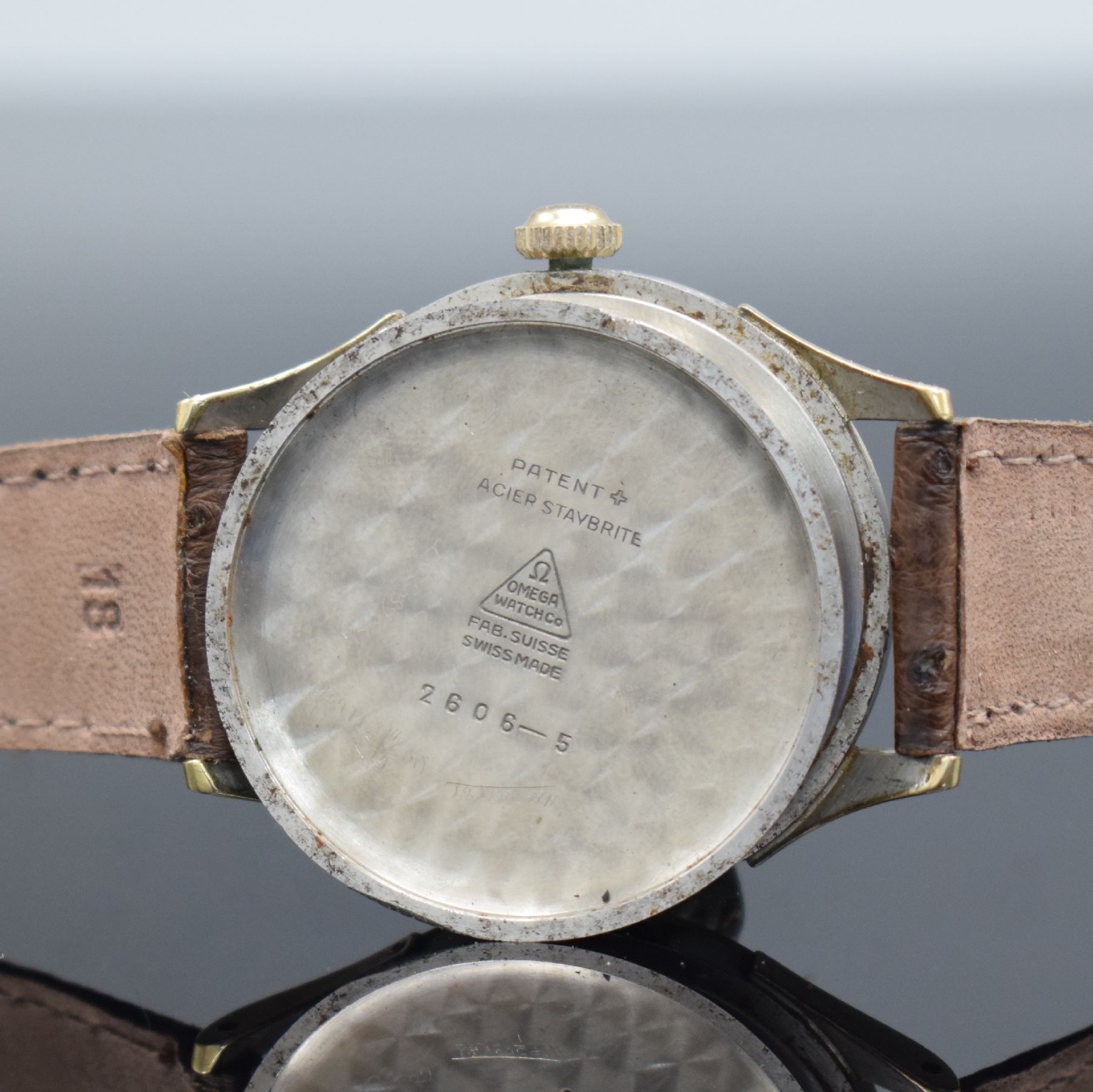 Detail f: OMEGA Cosmic Herrenarmbanduhr mit Vollkalenderanzeige inklusive Mondphase Referenz 2606-5, Handaufzug, Schweiz um 1951, Edelstahlgeh., starke ...