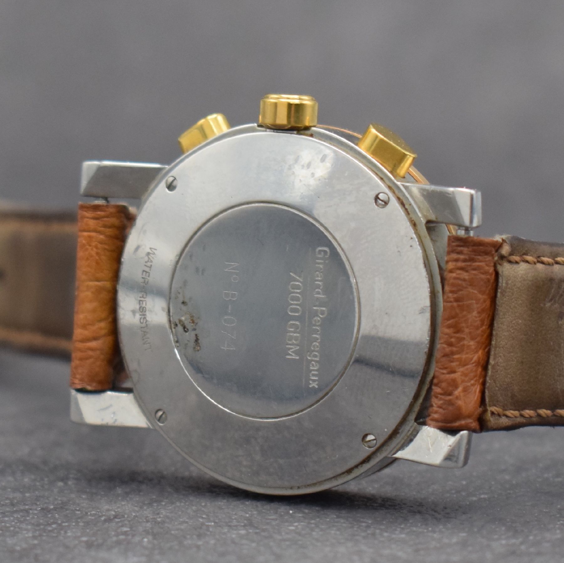 Detail e: GIRARD PERREGAUX Herrenchronograph in Stahl und 18k Rotgold, Schweiz um 2000, Automatik, 4-fach verschr. Geh., Rotgold Tachymeter- Lünette, weißes ...