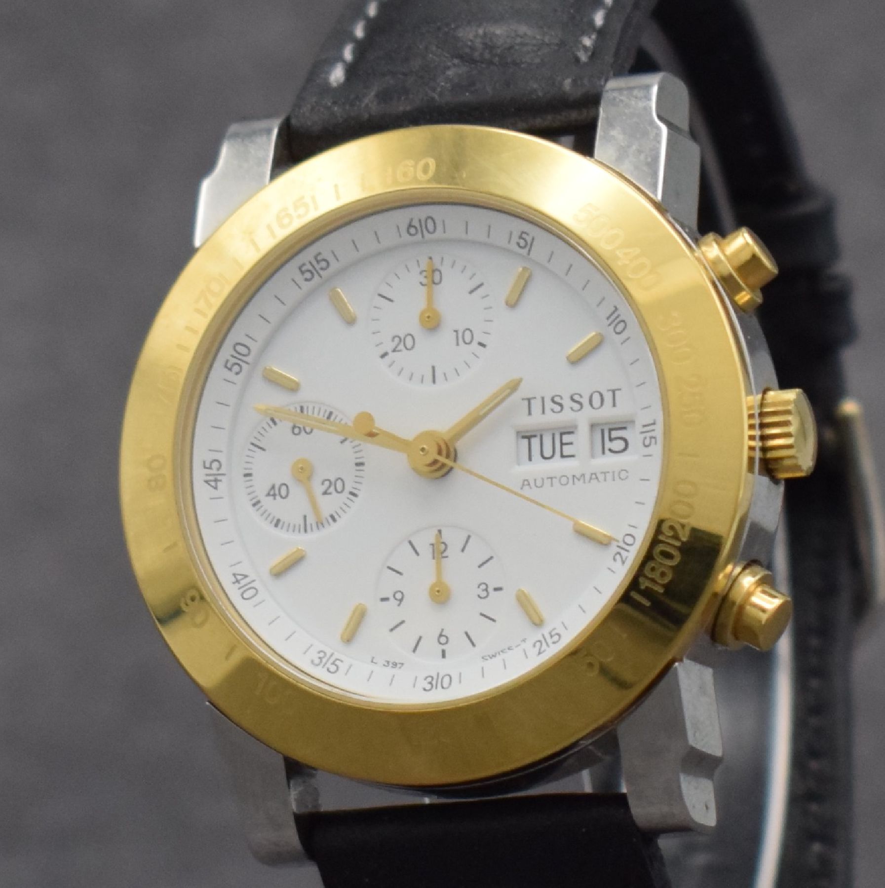 Detail c: TISSOT Herrenchronograph in Stahl/vergoldet, Schweiz um 2000, Automatik, gedr. Geh. m. verg. Tachymeter-Lünette, weißes Zifferbl., gold. Indizes & ...