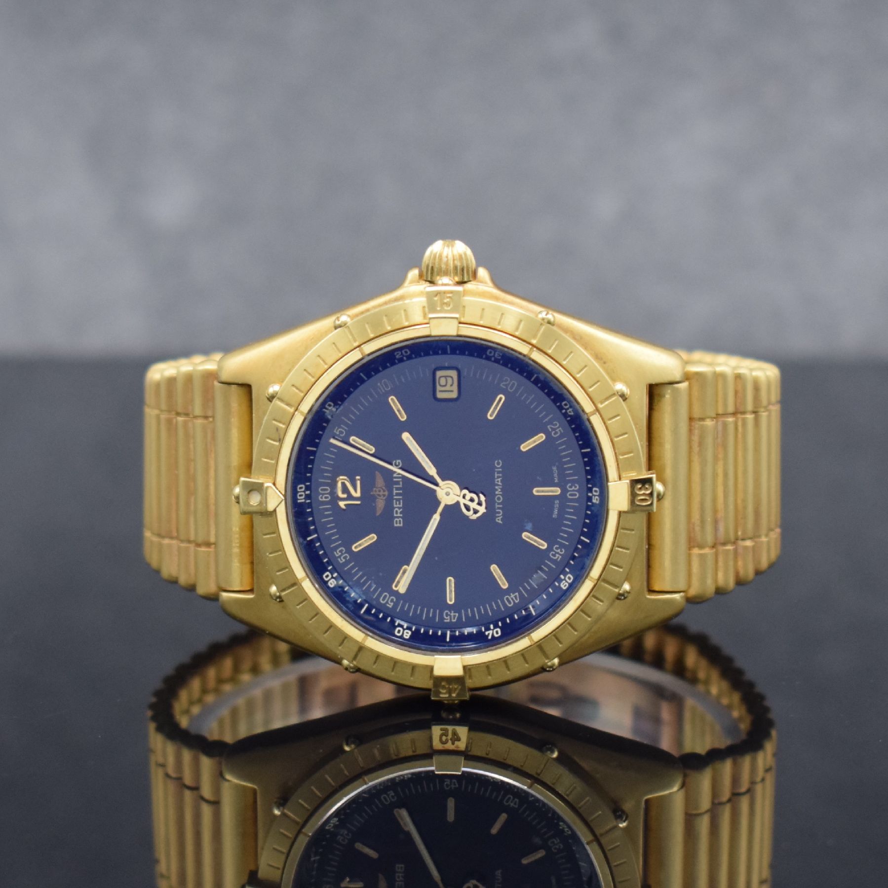 BREITLING Antares schwere Herrenarmbanduhr mit Roleaux-Band in GG 750/000, Schweiz um 1990, Automatik, satin. Geh., Ref. 81970, eins. drehb. Lünette ...