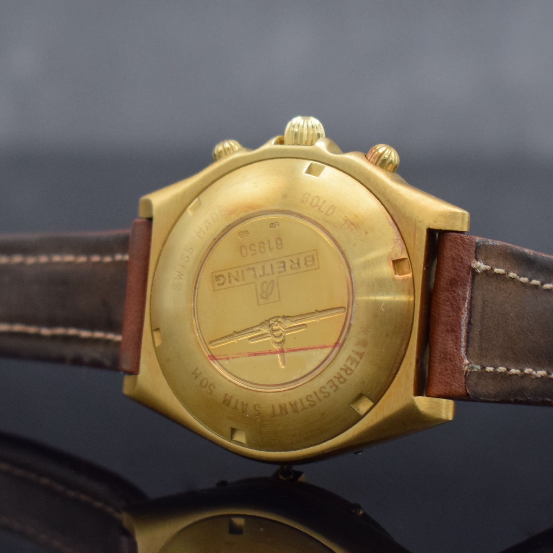 Detail e: BREITLING Chronomat Herrenchronograph in GG 750/000 Referenz 81950, Schweiz um 1990, Automatik, schweres satin. Geh., Boden & Krone verschr., ...