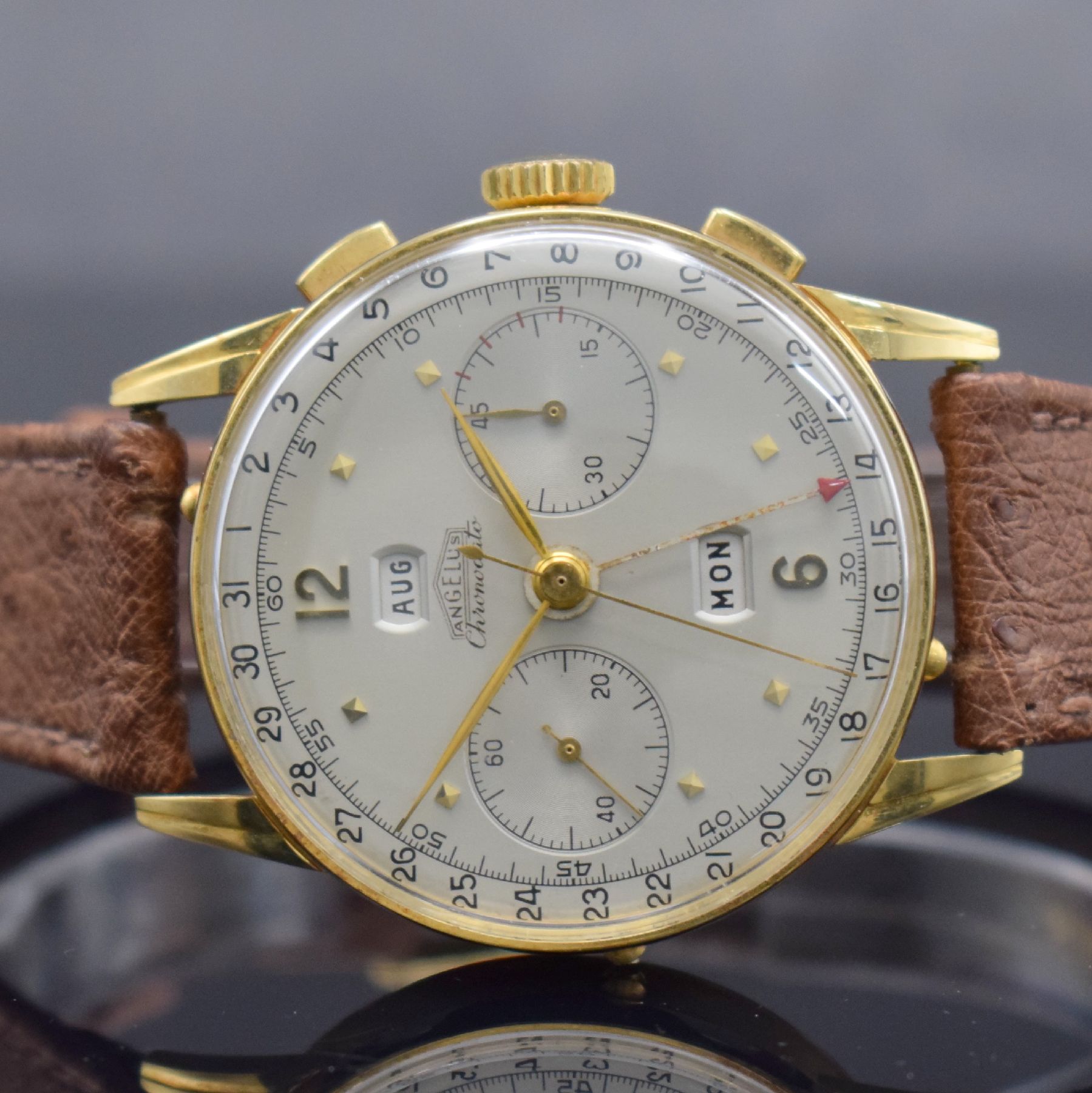 Detail a: ANGELUS Chronodato seltener Schaltradchronograph mit Vollkalender in GG 750/000, Schweiz um 1945, Handaufzug, 3-tlg. Geh., Boden & Glasrand aufgedr., ...