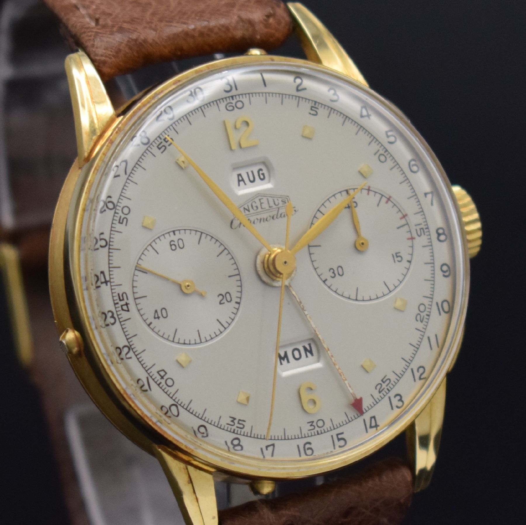 Detail e: ANGELUS Chronodato seltener Schaltradchronograph mit Vollkalender in GG 750/000, Schweiz um 1945, Handaufzug, 3-tlg. Geh., Boden & Glasrand aufgedr., ...